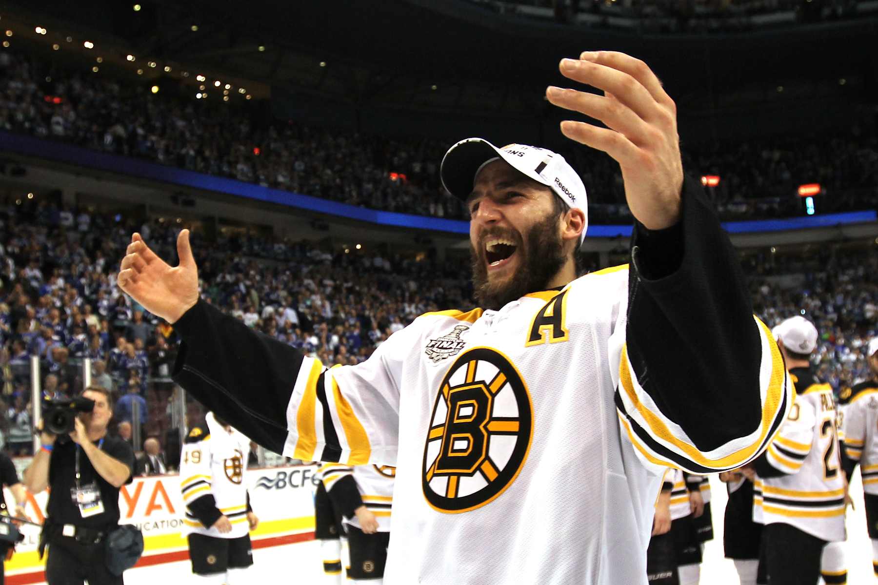 VANCOUVER, BC - JUNE 15: Patrice Bergeron #37 of the Boston Bruins celebrates winning the Stanley Cup after defeating the Vancouver Canucks in Game Seven of the 2011 NHL Stanley Cup Final at Rogers Arena on June 15, 2011 in Vancouver, British Columbia, Canada. The Boston Bruins defeated the Vancouver Canucks 4 to 0. (Photo by Bruce Bennett/Getty Images)