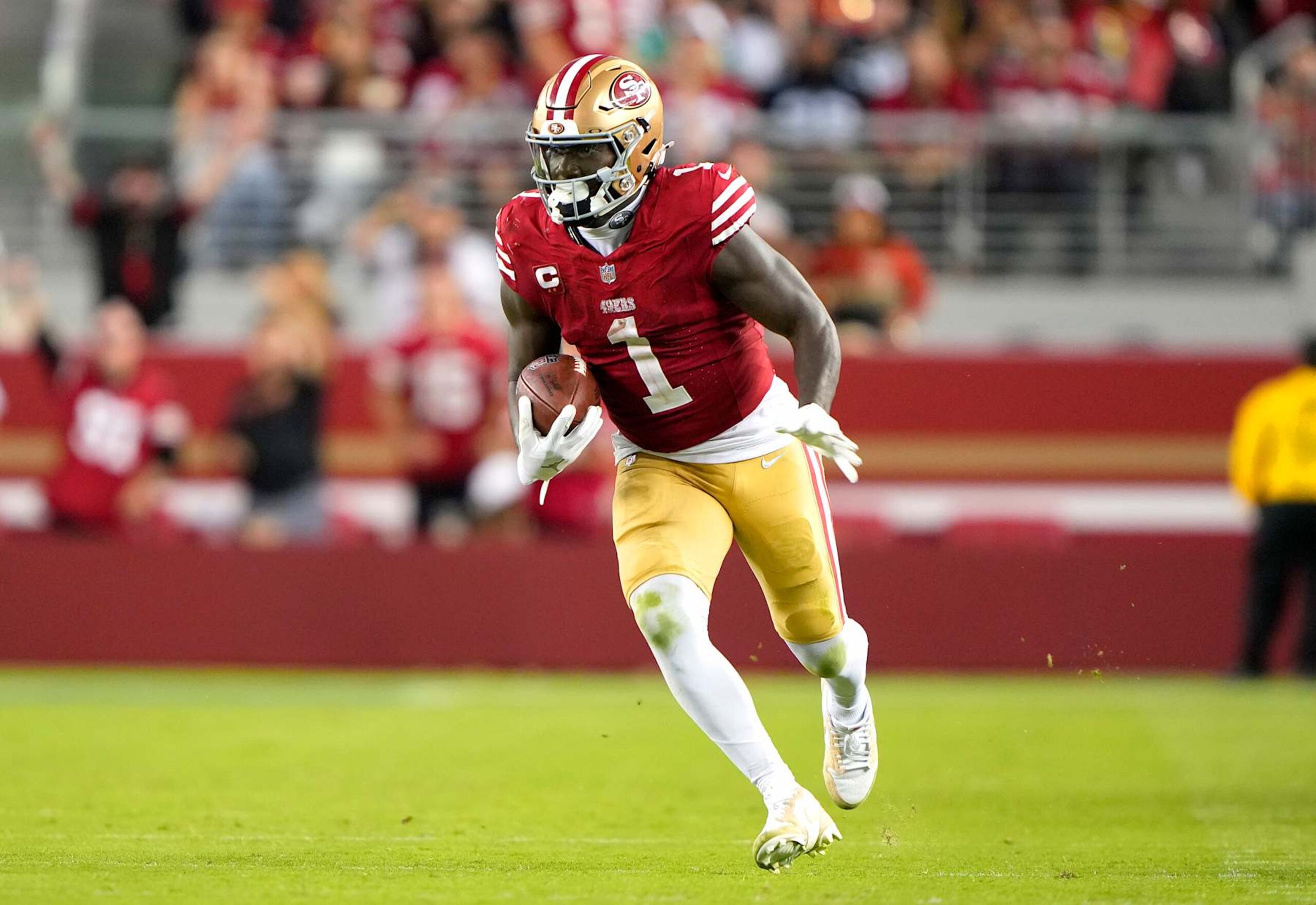 SANTA CLARA, CALIFORNIA - SEPTEMBER 09: Deebo Samuel Sr. #1 of the San Francisco 49ers runs with the ball after a catch against the New York Jets during the fourth quarter at Levi's Stadium on September 09, 2024 in Santa Clara, California. (Photo by Thearon W. Henderson/Getty Images) SANTA CLARA, CALIFORNIA - SEPTEMBER 09: Deebo Samuel Sr. #1 of the San Francisco 49ers runs with the ball after a catch against the New York Jets during the fourth quarter at Levi's Stadium on September 09, 2024 in Santa Clara, California. (Photo by Thearon W. Henderson/Getty Images)