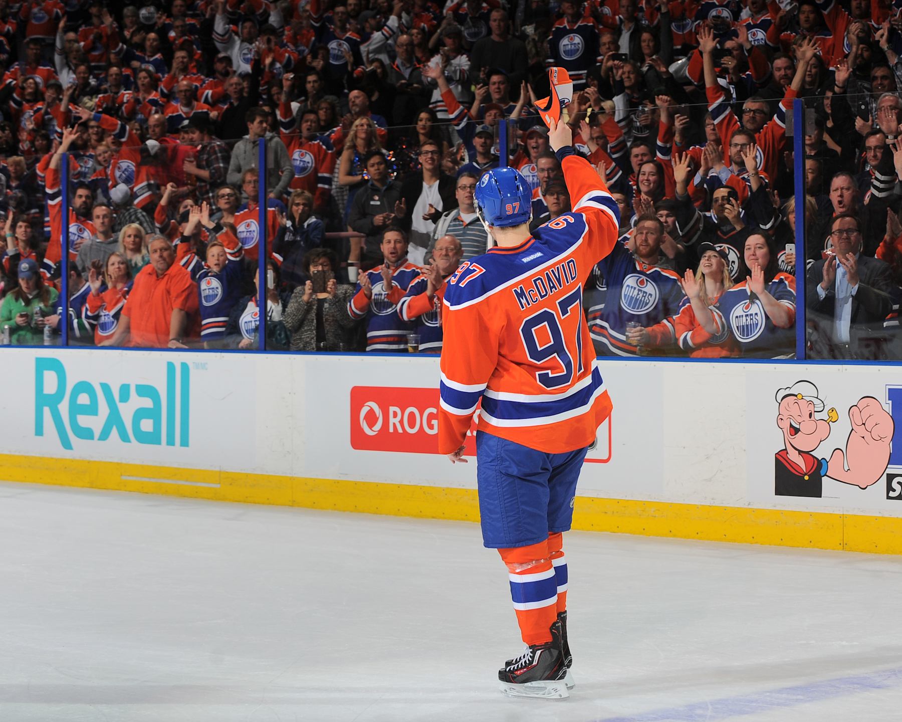EDMONTON, AB - APRIL 6: Connor McDavid #97 of the Edmonton Oilers salutes the crowed after being selected as the third star of the game against the Vancouver Canucks on April 6, 2016 at Rexall Place in Edmonton, Alberta, Canada. (Photo by Andy Devlin/NHLI via Getty Images)
