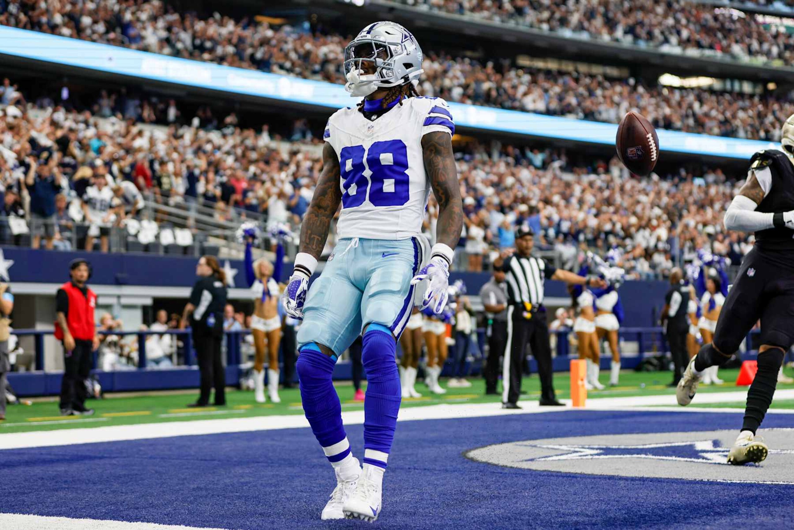 ARLINGTON, TX - SEPTEMBER 15: Dallas Cowboys wide receiver CeeDee Lamb (88) celebrates scoring a touchdown during the game between the Dallas Cowboys and the New Orleans Saints on September 15, 2024 at AT&T Stadium in Arlington, Texas. (Photo by Matthew Pearce/Icon Sportswire via Getty Images)