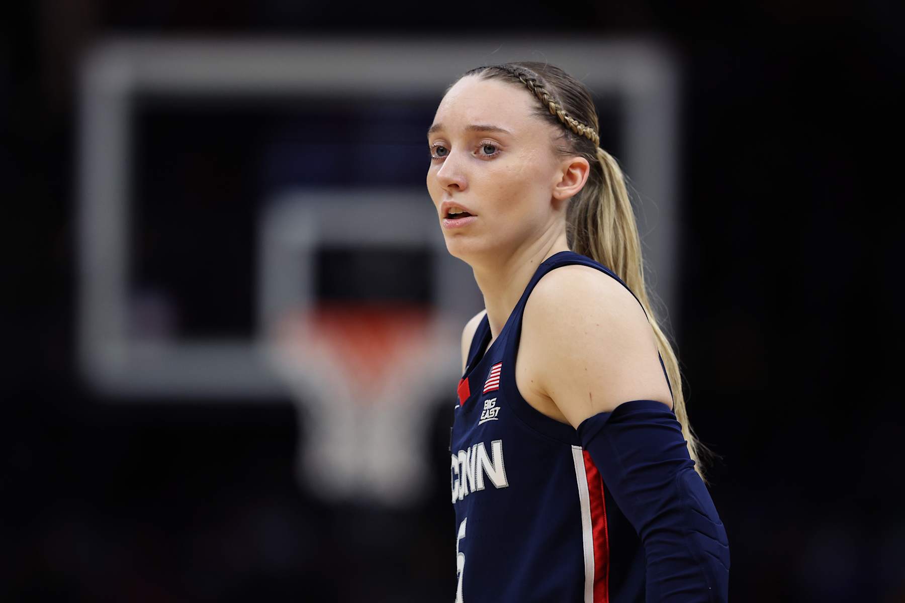 CLEVELAND, OHIO - APRIL 05: Paige Bueckers #5 of the UConn Huskies looks on during the NCAA Women's Basketball Tournament Final Four semifinal game against the Iowa Hawkeyes at Rocket Mortgage Fieldhouse on April 05, 2024 in Cleveland, Ohio. (Photo by Steph Chambers/Getty Images)