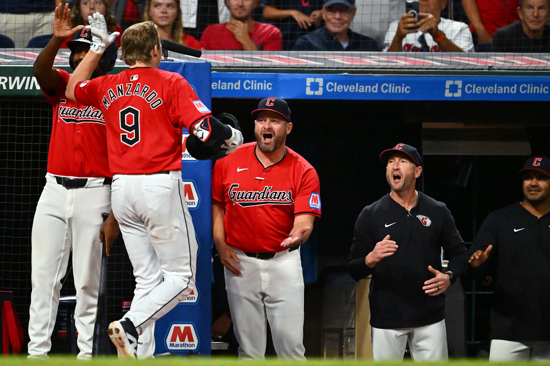 CLEVELAND, OHIO - SEPTEMBER 16: Kyle Manzardo #9 celebrates with manager Stephen Vogt #12 of the Cleveland Guardians after Manzardo hit a two-run homer during the eighth inning against the Minnesota Twins at Progressive Field on September 16, 2024 in Cleveland, Ohio. (Photo by Jason Miller/Getty Images)