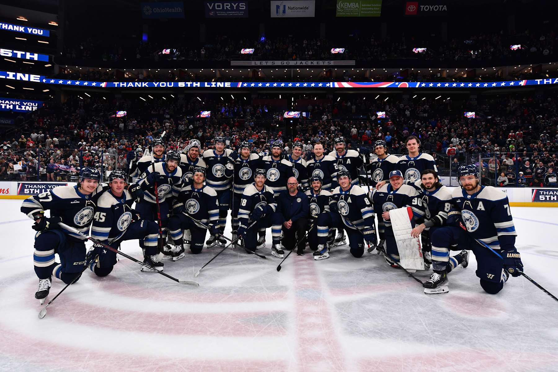 COLUMBUS, OHIO - APRIL 16: The Columbus Blue Jackets pose with assistant equipment manager Jason Stypinski of the Columbus Blue Jackets following his final game with the team at Nationwide Arena on April 16, 2024 in Columbus, Ohio. (Photo by Ben Jackson/NHLI via Getty Images)