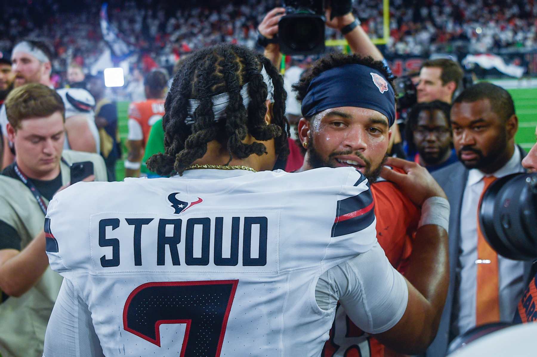 HOUSTON, TX - SEPTEMBER 15: Houston Texans quarterback C.J. Stroud (7) shakes hands with Chicago Bears quarterback Caleb Williams (18) near midfield following the football game between the Chicago Bears and Houston Texans on September 15, 2024 at NRG Stadium in Houston, Texas. (Photo by Ken Murray/Icon Sportswire via Getty Images)