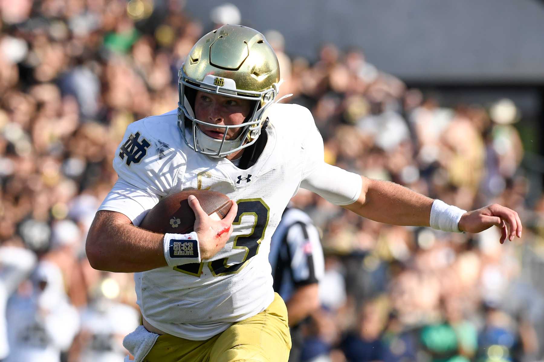 WEST LAFAYETTE, IN - SEPTEMBER 14: Notre Dame Fighting Irish Quarterback Riley Leonard (13) advances the ball during the college football game between the Notre Dame Fighting Irish and the Purdue Boilermakers on September 14, 2024, at Ross-Ade Stadium in West Lafayette, Indiana. (Photo by Michael Allio/Icon Sportswire via Getty Images)