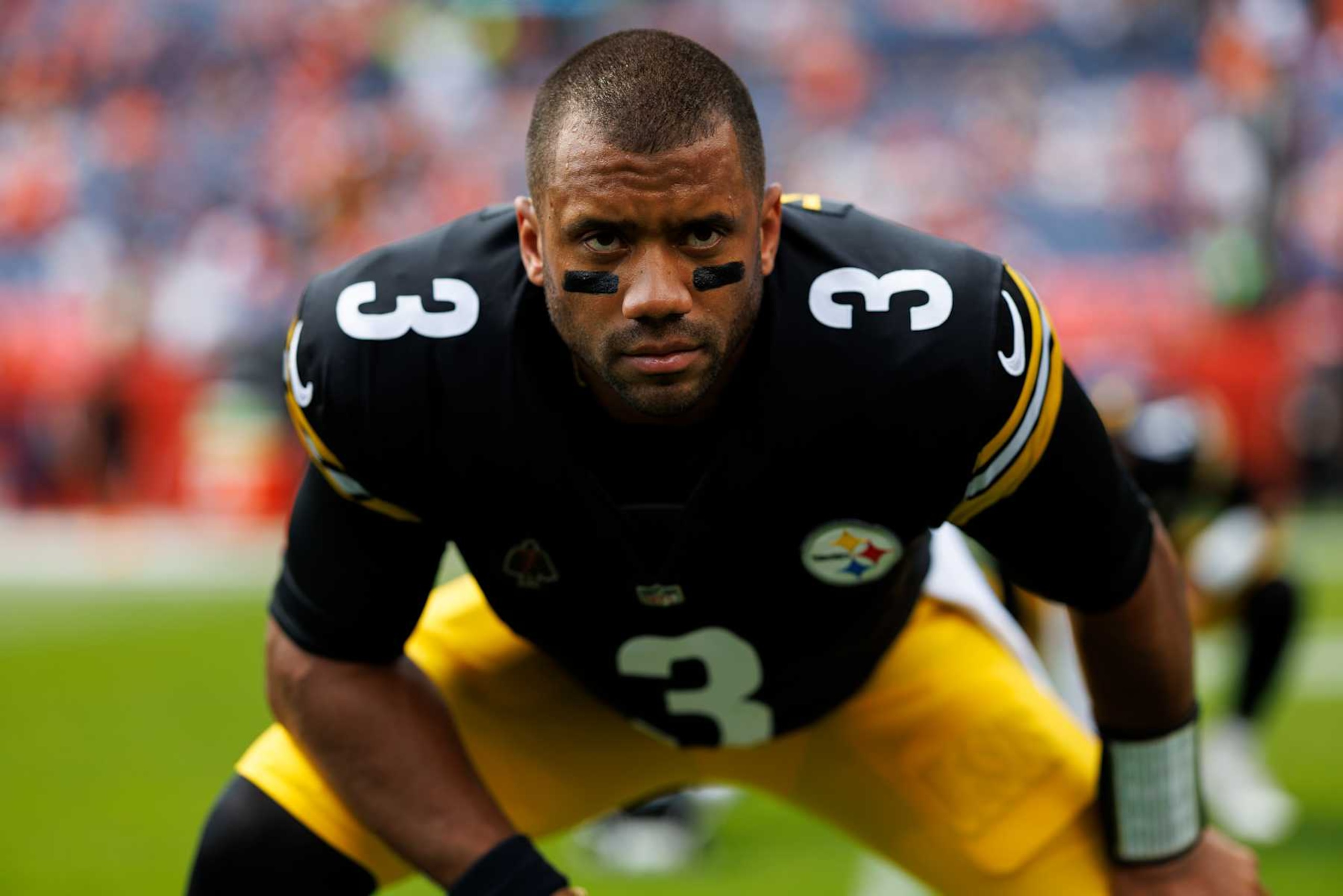 DENVER, CO - SEPTEMBER 15: Quarterback Russell Wilson #3 of the Pittsburgh Steelers stretches prior to an NFL football game against the Denver Broncos, at Empower Field at Mile High on September 15, 2024 in Denver, Colorado. (Photo by Brooke Sutton/Getty Images)