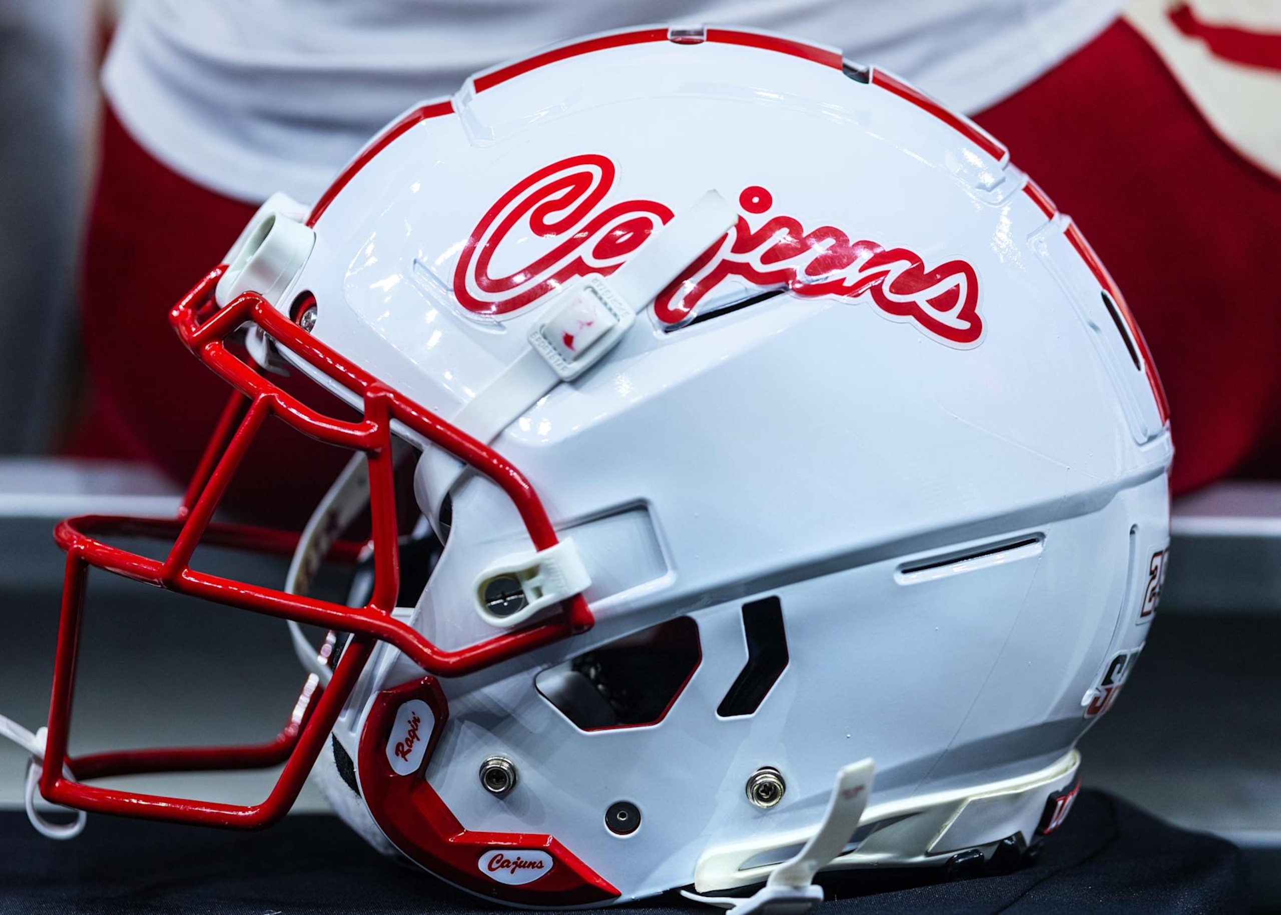 NEW ORLEANS, LA - DECEMBER 16: A Louisiana-Lafayette Ragin Cajuns helmet rests on the sideline during the R+L Carriers New Orleans Bowl between the Jacksonville State Jaguars and the Louisiana Ragin Cajuns on December 16, 2023, at the Caesars Superdome in New Orleans, Louisiana. (Photo by John Korduner/Icon Sportswire via Getty Images)