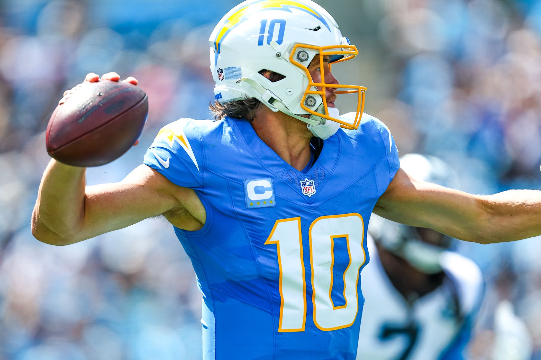 CHARLOTTE, NC - SEPTEMBER 15: Justin Herbert #10 of the Los Angeles Chargers looks to pass the ball during a football game against the Carolina Panthers at Bank of America Stadium on September 15, 2024 in Charlotte, North Carolina. (Photo by David Jensen/Icon Sportswire via Getty Images)