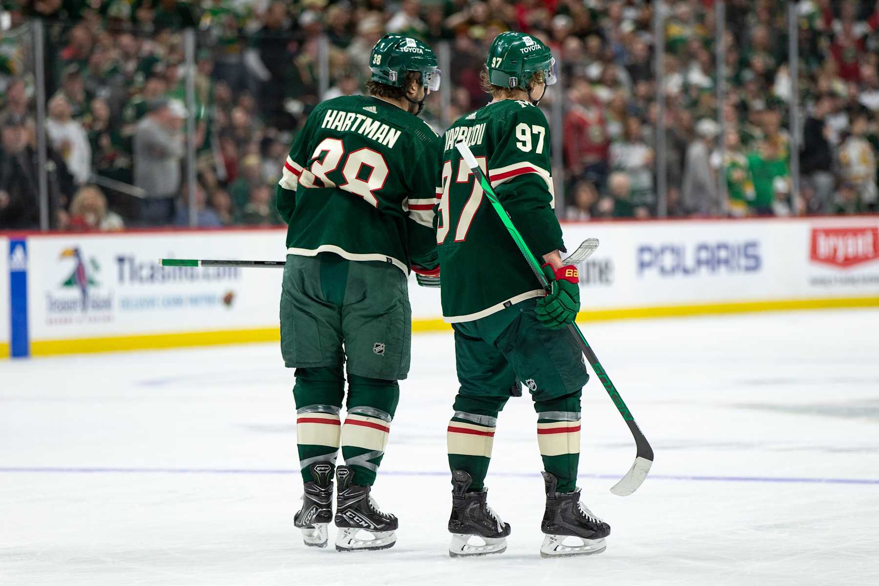 SAINT PAUL, MN - APRIL 21: Minnesota Wild left wing Kirill Kaprizov (97) talks with Minnesota Wild right wing Ryan Hartman (38) during the NHL game between the Minnesota Wild and the Dallas Stars, on April 21st, 2023, at the Xcel Energy Center in Saint Paul, MN. (Photo by Bailey Hillesheim/Icon Sportswire via Getty Images)