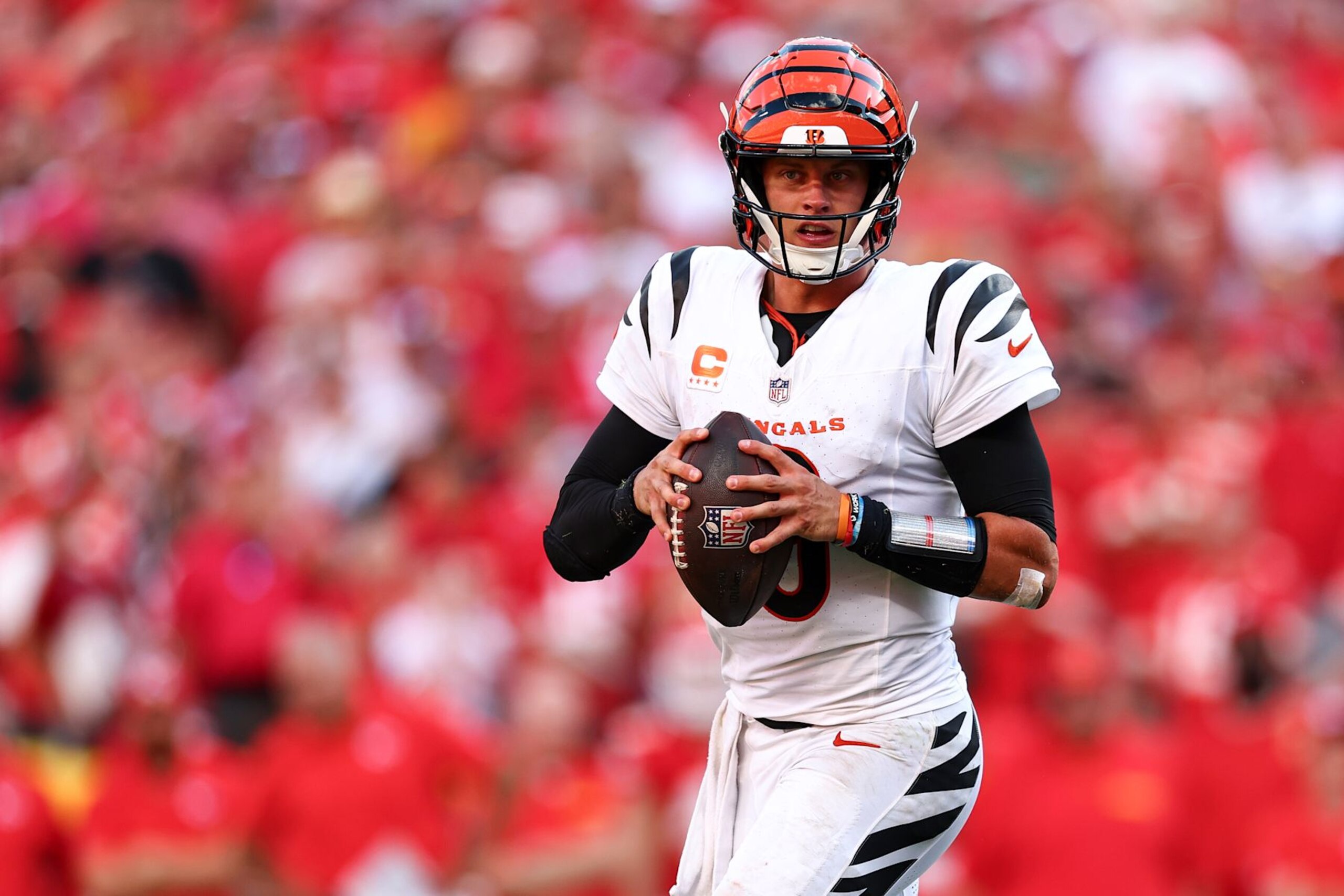 KANSAS CITY, MO - SEPTEMBER 15: Joe Burrow #9 of the Cincinnati Bengals drops back to pass during an NFL football game against the Kansas City Chiefs at GEHA Field at Arrowhead Stadium on September 15, 2024 in Kansas City, Missouri. (Photo by Kevin Sabitus/Getty Images)