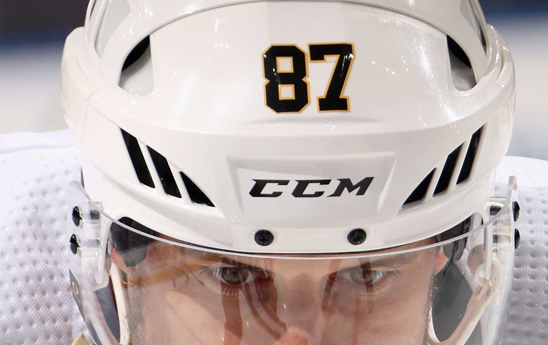 ELMONT, NEW YORK - APRIL 17: Sidney Crosby #87 of the Pittsburgh Penguins takes a third period faceoff against the New York Islanders at UBS Arena on April 17, 2024 in Elmont, New York. (Photo by Bruce Bennett/Getty Images)