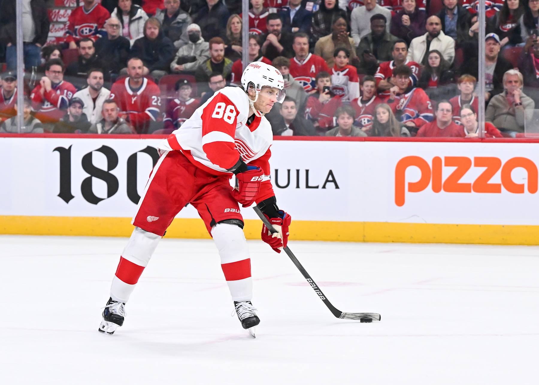 MONTREAL, CANADA - APRIL 16:  Patrick Kane #88 of the Detroit Red Wings makes his approach with the puck during the shootout against the Montreal Canadiens at the Bell Centre on April 16, 2024 in Montreal, Quebec, Canada.  The Detroit Red Wings defeated the Montreal Canadiens 5-4 in a shootout.  (Photo by Minas Panagiotakis/Getty Images)