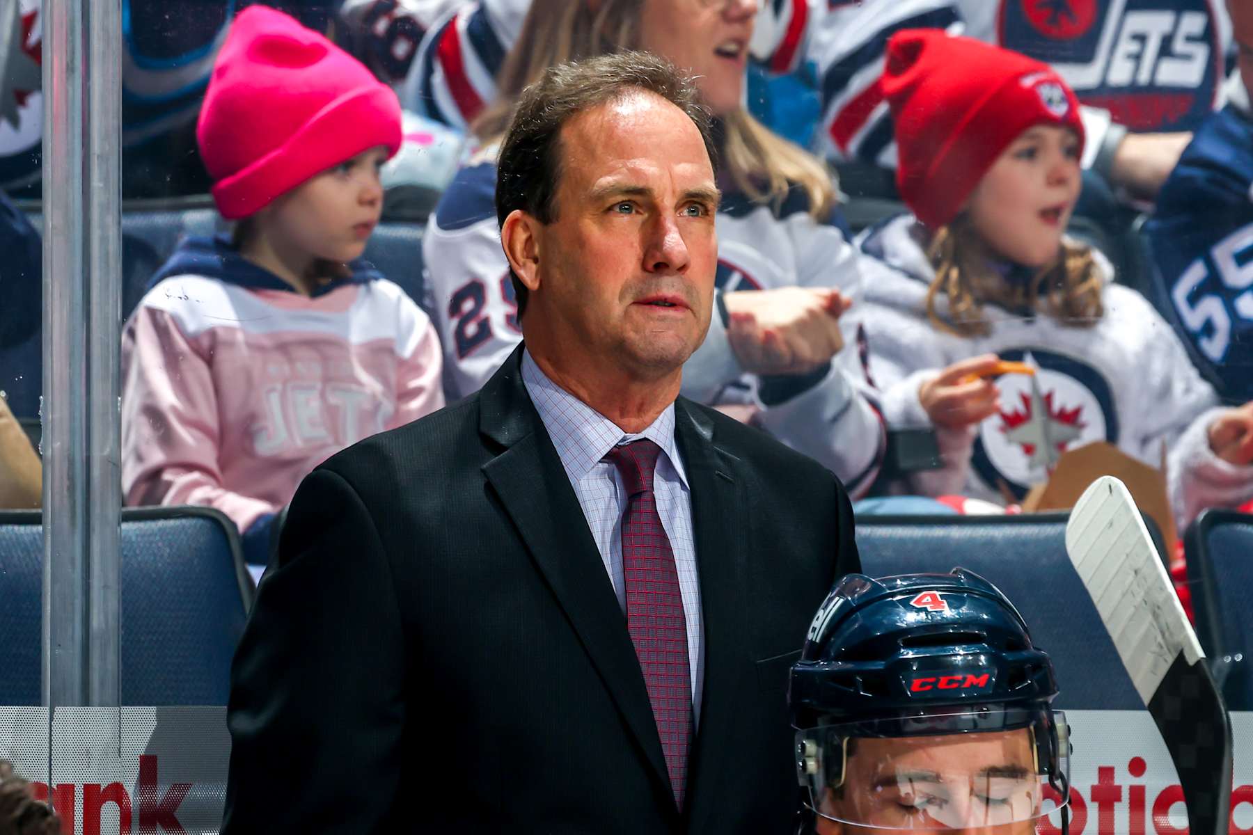 WINNIPEG, CANADA - FEBRUARY 14: Associate coach Scott Arniel of the Winnipeg Jets looks on from the bench prior to NHL action against the San Jose Sharks at Canada Life Centre on February 14, 2024 in Winnipeg, Manitoba, Canada. (Photo by Jonathan Kozub/NHLI via Getty Images)