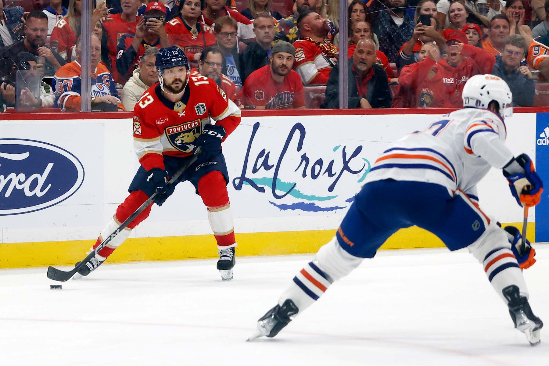 SUNRISE, FL - JUNE 24: Sam Reinhart #13 of the Florida Panthers skates with the puck against the Edmonton Oilers in Game Seven of the Final of the 2024 Stanley Cup Playoffs at the Amerant Bank Arena on June 24, 2024 in Sunrise, Florida. (Photo by Joel Auerbach/Getty Images)