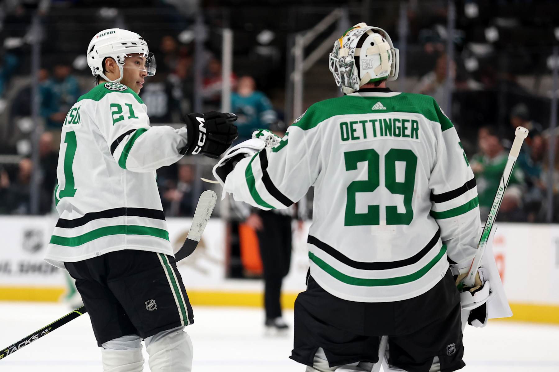SAN JOSE, CALIFORNIA - MARCH 05: Jake Oettinger #29 of the Dallas Stars is congratulated by Jason Robertson #21 after they beat the San Jose Sharks in overtime at SAP Center on March 05, 2024 in San Jose, California. (Photo by Ezra Shaw/Getty Images)