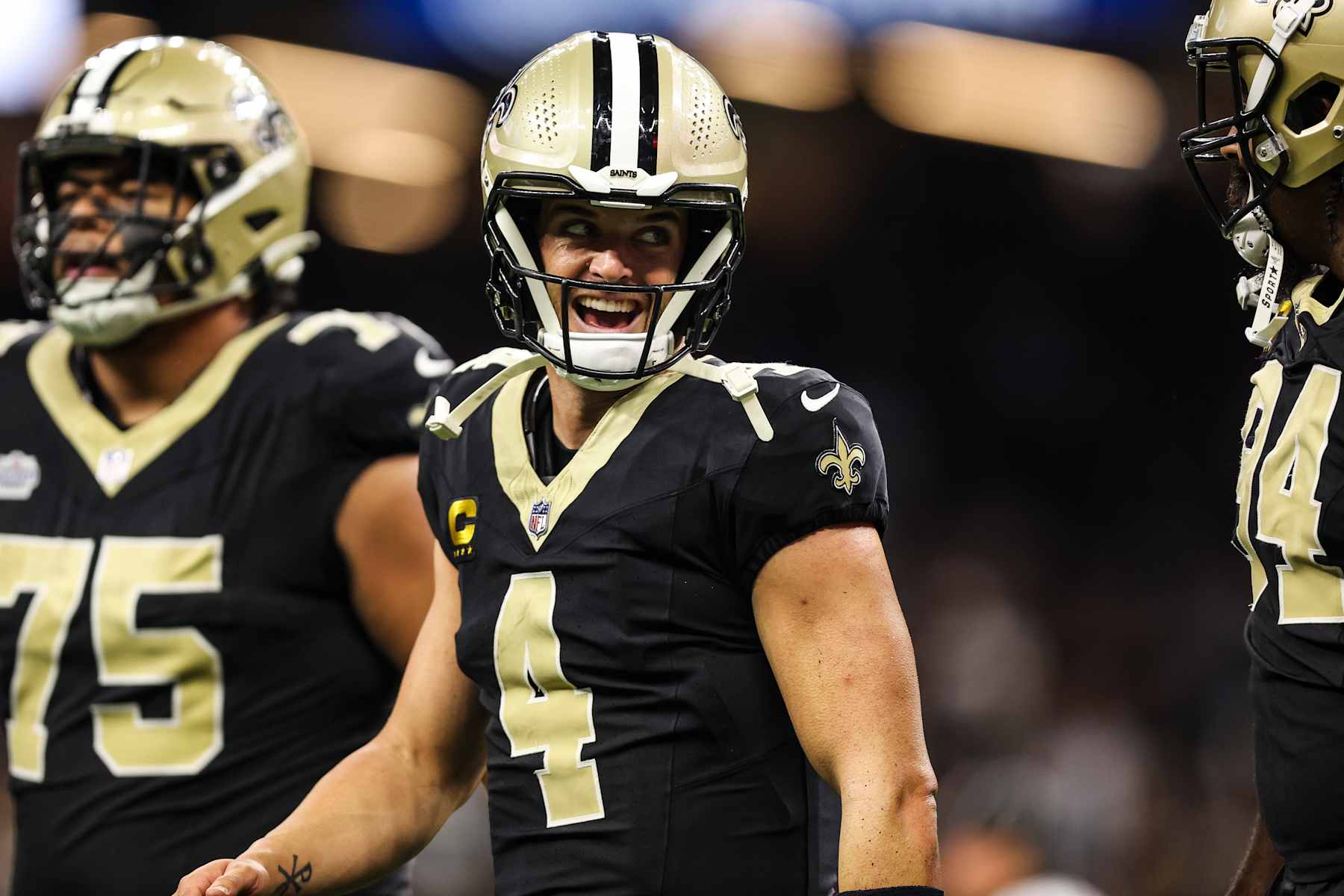 NEW ORLEANS, LA - SEPTEMBER 08: Derek Carr #4 of the New Orleans Saints celebrates during an NFL football game against the Carolina Panthers at Caesars Superdome on September 8, 2024 in New Orleans, Louisiana. (Photo by Perry Knotts/Getty Images)