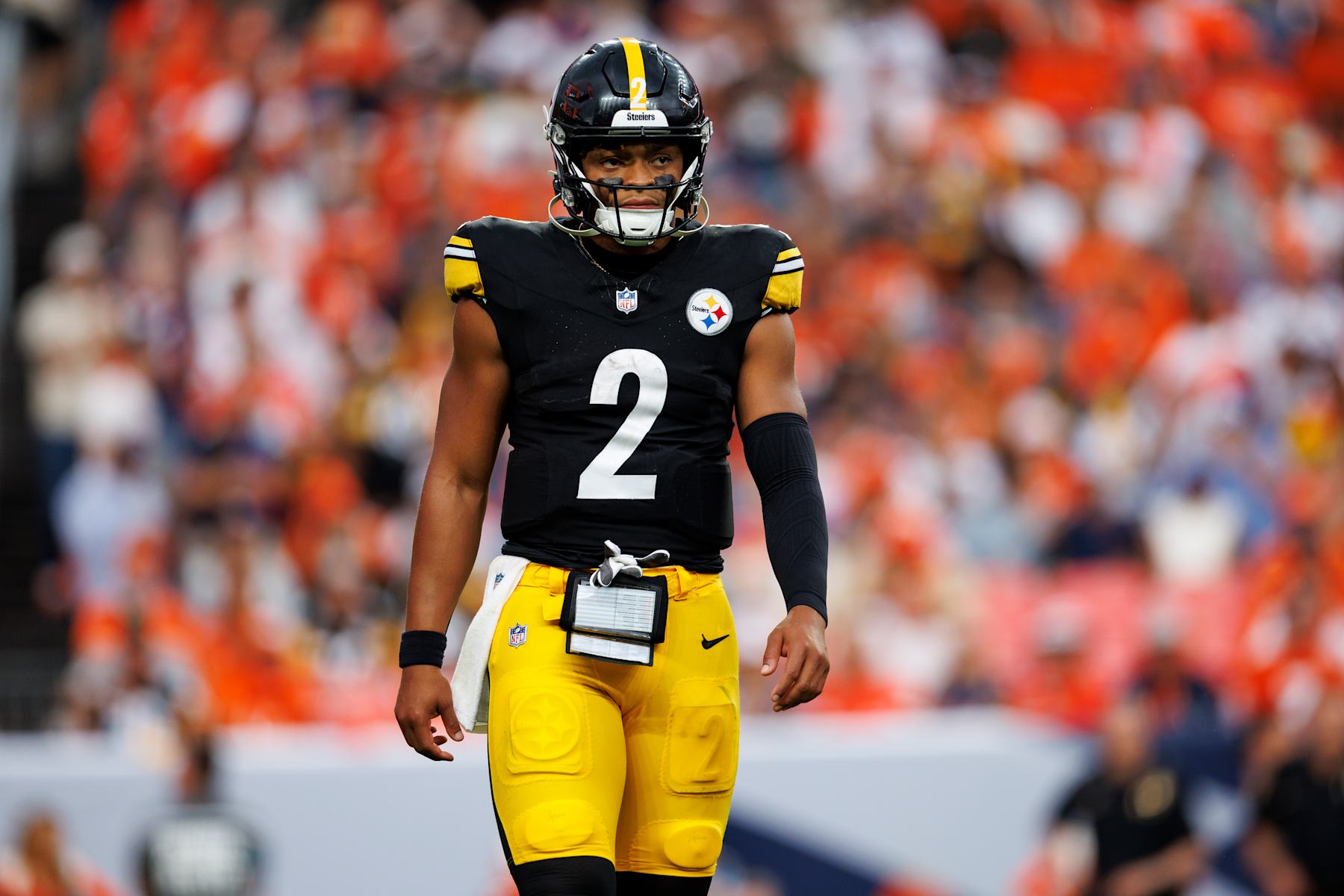 DENVER, CO - SEPTEMBER 15: Quarterback Justin Fields #2 of the Pittsburgh Steelers stands on the field during the fourth quarter of an NFL football game against the Denver Broncos, at Empower Field at Mile High on September 15, 2024 in Denver, Colorado. (Photo by Brooke Sutton/Getty Images)