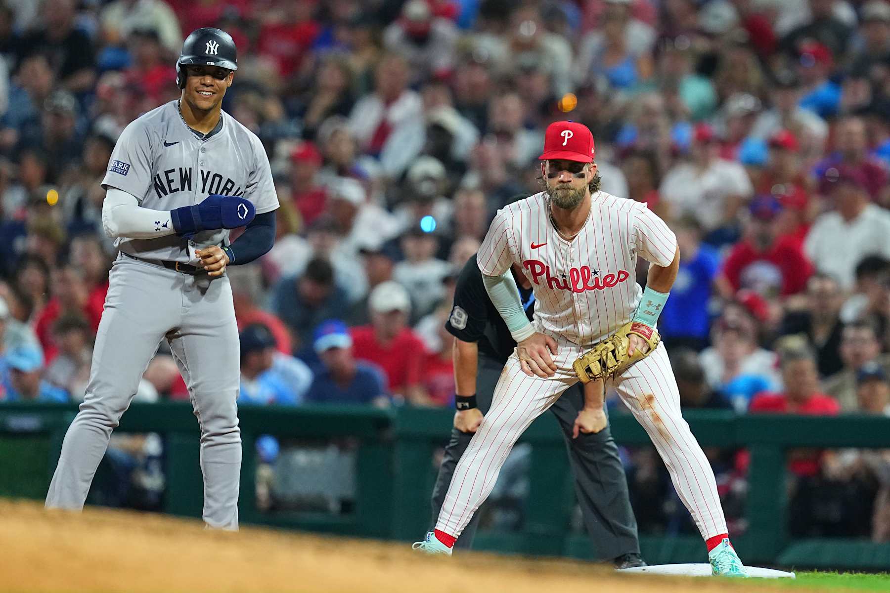 PHILADELPHIA, PENNSYLVANIA - JULY 29: Juan Soto #22 of the New York Yankees looks on against Bryce Harper #3 of the Philadelphia Phillies at Citizens Bank Park on July 29, 2024 in Philadelphia, Pennsylvania. The Yankees defeated the Phillies 14-4. (Photo by Mitchell Leff/Getty Images)