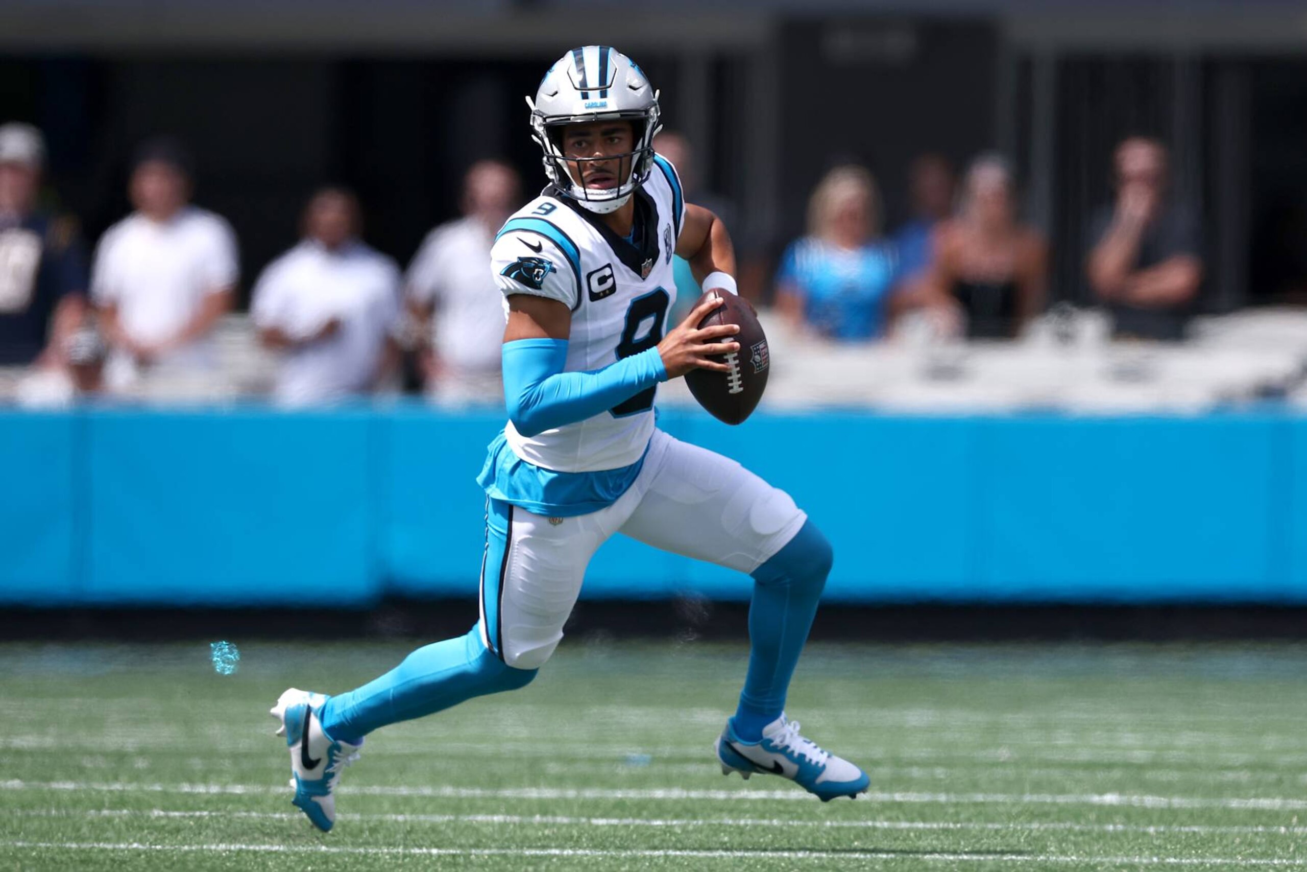 CHARLOTTE, NORTH CAROLINA - SEPTEMBER 15: Quarterback Bryce Young #9 of the Carolina Panthers scrambles from the pocket during the first half of the game at Bank of America Stadium on September 15, 2024 in Charlotte, North Carolina. (Photo by Jared C. Tilton/Getty Images)