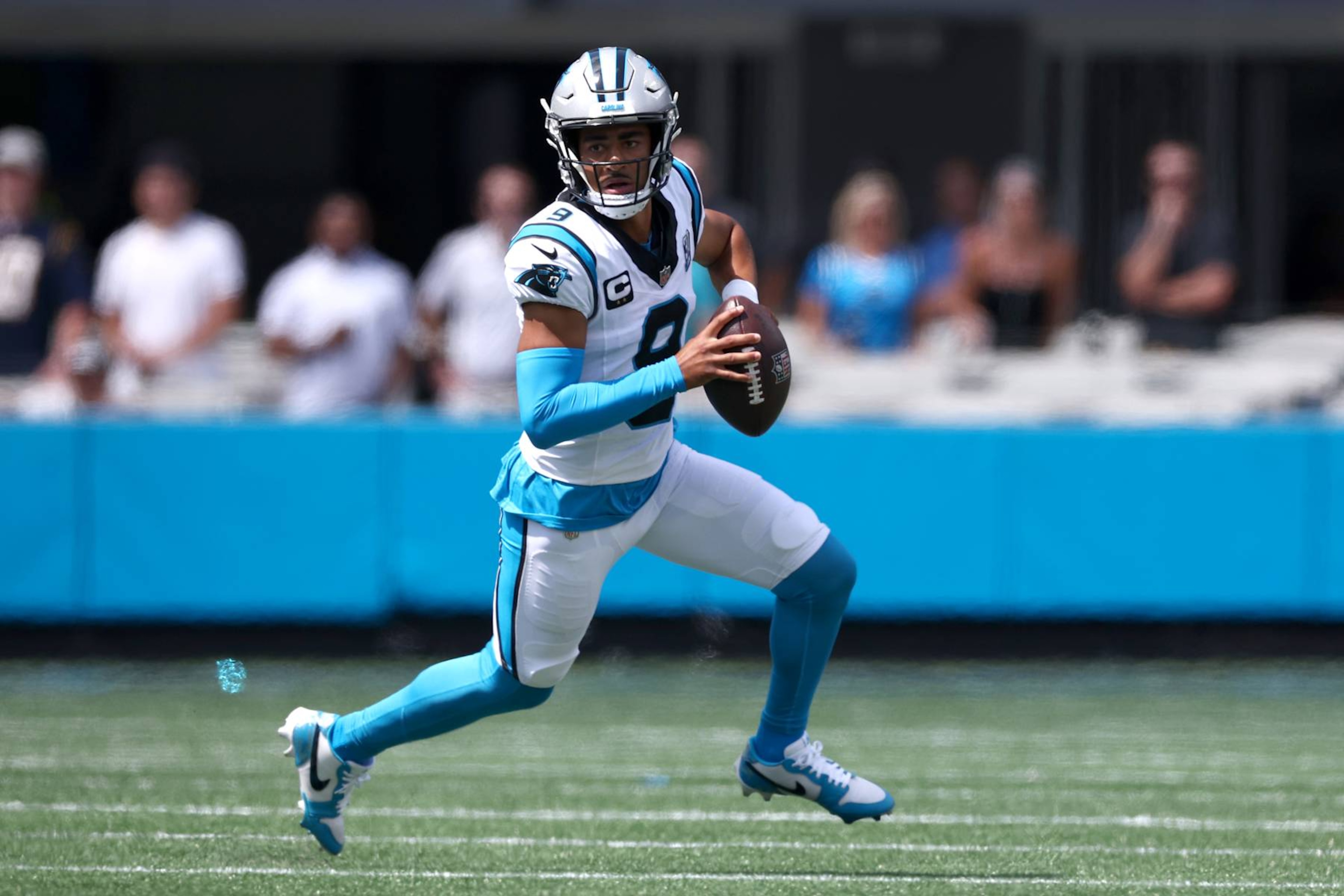 CHARLOTTE, NORTH CAROLINA - SEPTEMBER 15: Quarterback Bryce Young #9 of the Carolina Panthers scrambles from the pocket during the first half of the game at Bank of America Stadium on September 15, 2024 in Charlotte, North Carolina. (Photo by Jared C. Tilton/Getty Images) CHARLOTTE, NORTH CAROLINA - SEPTEMBER 15: Quarterback Bryce Young #9 of the Carolina Panthers scrambles from the pocket during the first half of the game at Bank of America Stadium on September 15, 2024 in Charlotte, North Carolina. (Photo by Jared C. Tilton/Getty Images)
