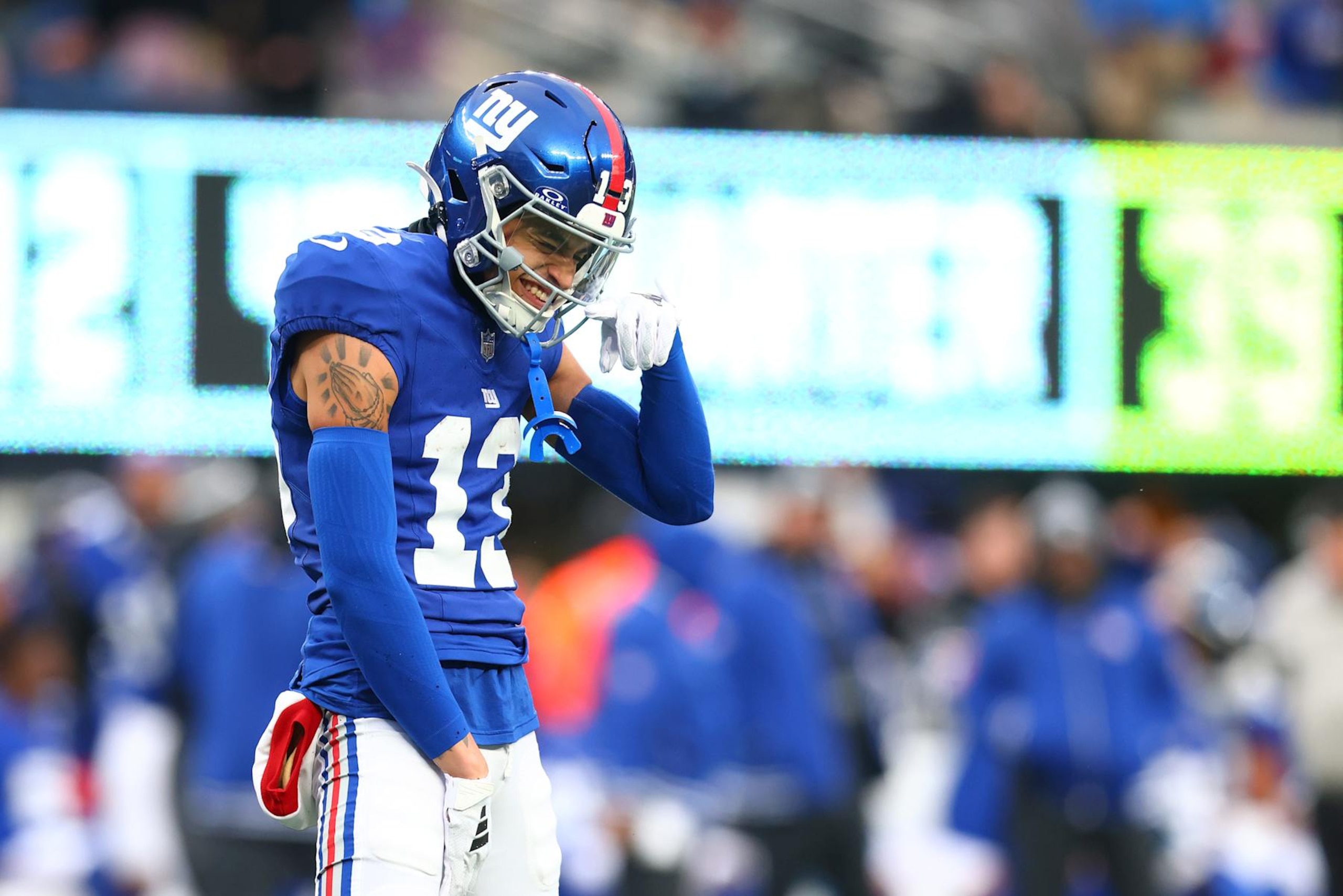 EAST RUTHERFORD, NEW JERSEY - DECEMBER 31: Jalin Hyatt #13 of the New York Giants in action against the Los Angeles Rams at MetLife Stadium on December 31, 2023 in East Rutherford, New Jersey. Los Angeles Rams defeated the New York Giants 26-25. (Photo by Mike Stobe/Getty Images)