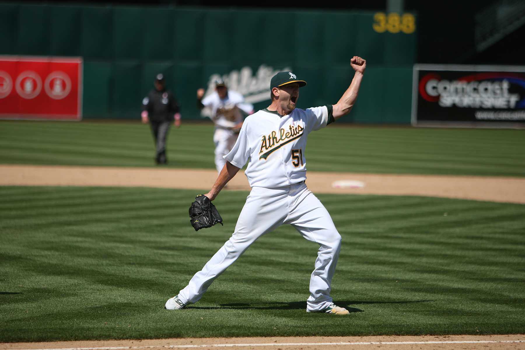 OAKLAND, CA - MAY 09: Dallas Braden of the Oakland Athletics celebrates his perfect game after the game between the Tampa Bay Rays and the Oakland Athletics on Sunday, May 9, 2010, at the Oakland Coliseum in Oakland, California. Dallas Braden pitched the 19th perfect game in Major League Baseball history. The Athletics defeated the Rays 4-0. (Photo by Brad Mangin/MLB via Getty Images)