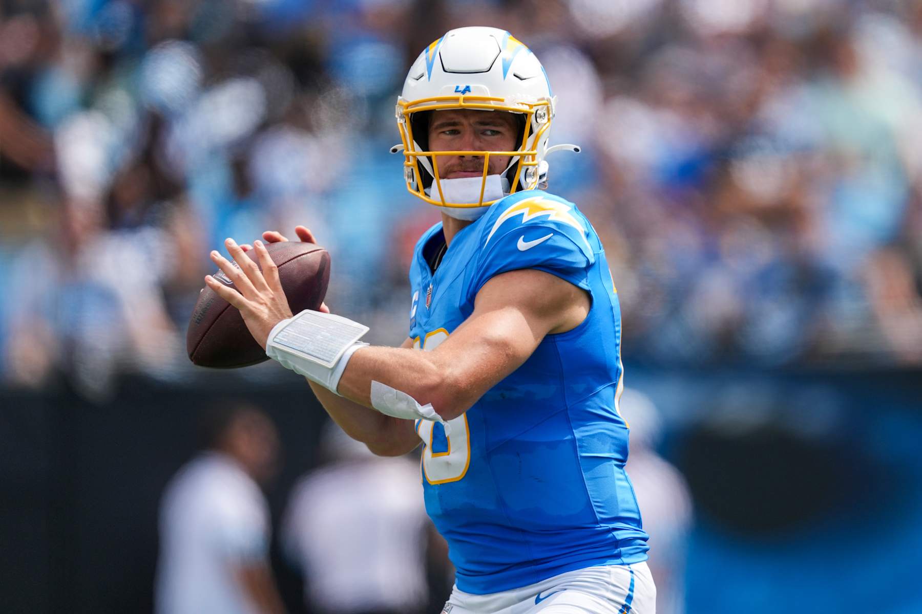 CHARLOTTE, NORTH CAROLINA - SEPTEMBER 15: Justin Herbert #10 of the Los Angeles Chargers looks to pass against the Carolina Panthers during the game at Bank of America Stadium on September 15, 2024 in Charlotte, North Carolina. (Photo by Grant Halverson/Getty Images)