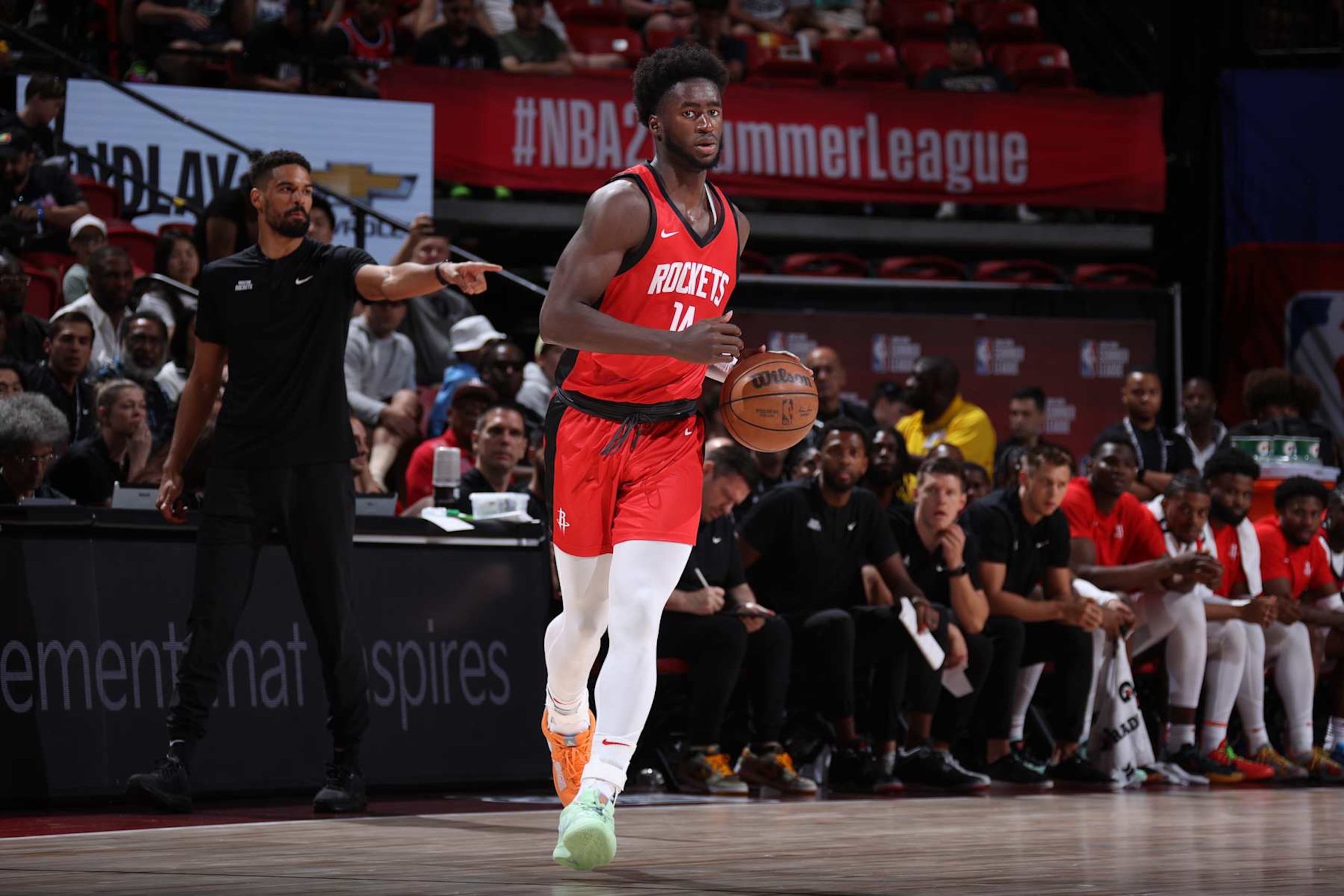 LAS VEGAS, NV - JULY 14: AJ Griffin #14 of the Houston Rockets dribbles the ball during the game against the Washington Wizards on July 14, 2024 at the Thomas & Mack Center in Las Vegas, Nevada. NOTE TO USER: User expressly acknowledges and agrees that, by downloading and or using this photograph, User is consenting to the terms and conditions of the Getty Images License Agreement. Mandatory Copyright Notice: Copyright 2024 NBAE (Photo by Stephen Gosling/NBAE via Getty Images) LAS VEGAS, NV - JULY 14: AJ Griffin #14 of the Houston Rockets dribbles the ball during the game against the Washington Wizards on July 14, 2024 at the Thomas & Mack Center in Las Vegas, Nevada. NOTE TO USER: User expressly acknowledges and agrees that, by downloading and or using this photograph, User is consenting to the terms and conditions of the Getty Images License Agreement. Mandatory Copyright Notice: Copyright 2024 NBAE (Photo by Stephen Gosling/NBAE via Getty Images)