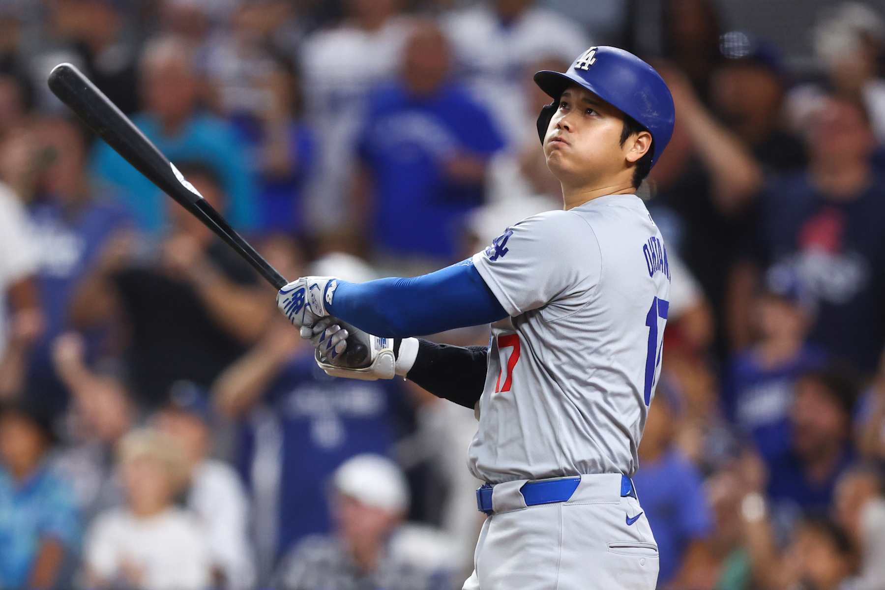 MIAMI, FLORIDA - SEPTEMBER 19: Shohei Ohtani #17 of the Los Angeles Dodgers hits a two-run home run, his 50th of the season, becoming the first player with a 50/50 season in MLB history, during the seventh inning against the Miami Marlins at loanDepot park on September 19, 2024 in Miami, Florida. (Photo by Megan Briggs/Getty Images)