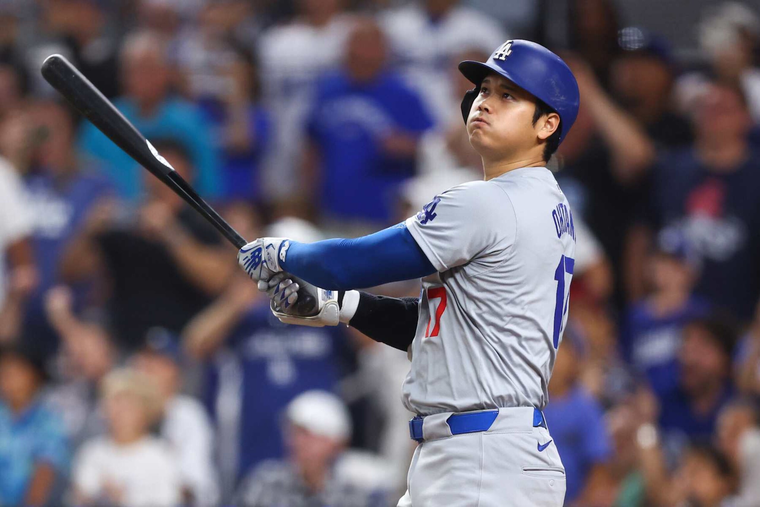 MIAMI, FLORIDA - SEPTEMBER 19: Shohei Ohtani #17 of the Los Angeles Dodgers hits a two-run home run, his 50th of the season, becoming the first player with a 50/50 season in MLB history, during the seventh inning against the Miami Marlins at loanDepot park on September 19, 2024 in Miami, Florida. (Photo by Megan Briggs/Getty Images)