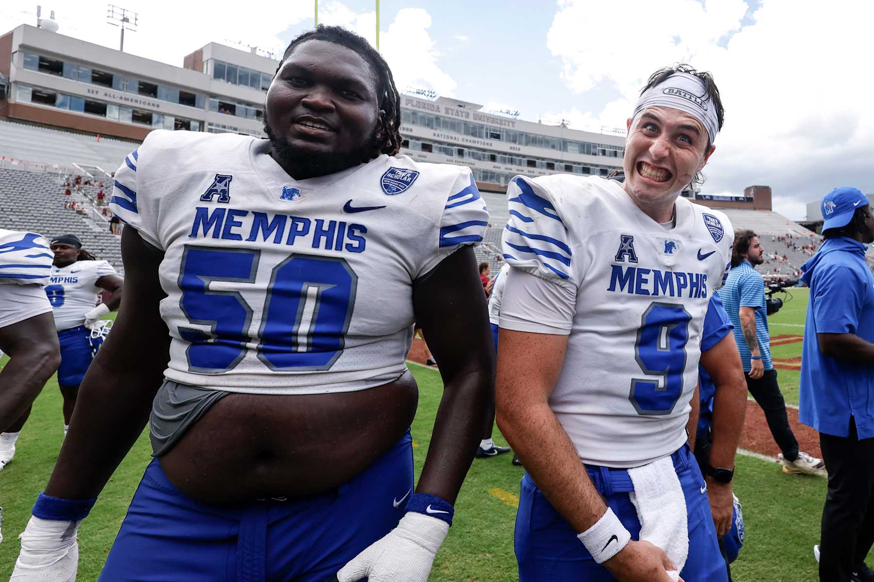 TALLAHASSEE, FL - SEPTEMBER 14: Defensive Tackle Patrick Lucas Jr. #50 and Quarterback Seth Henigan #9 of the Memphis Tigers celebrates after the game against the Florida State Seminoles at Doak Campbell Stadium on Bobby Bowden Field on September 14, 2024 in Tallahassee, Florida. The Tigers defeated the Seminoles 20 to 12. (Photo by Don Juan Moore/Getty Images)