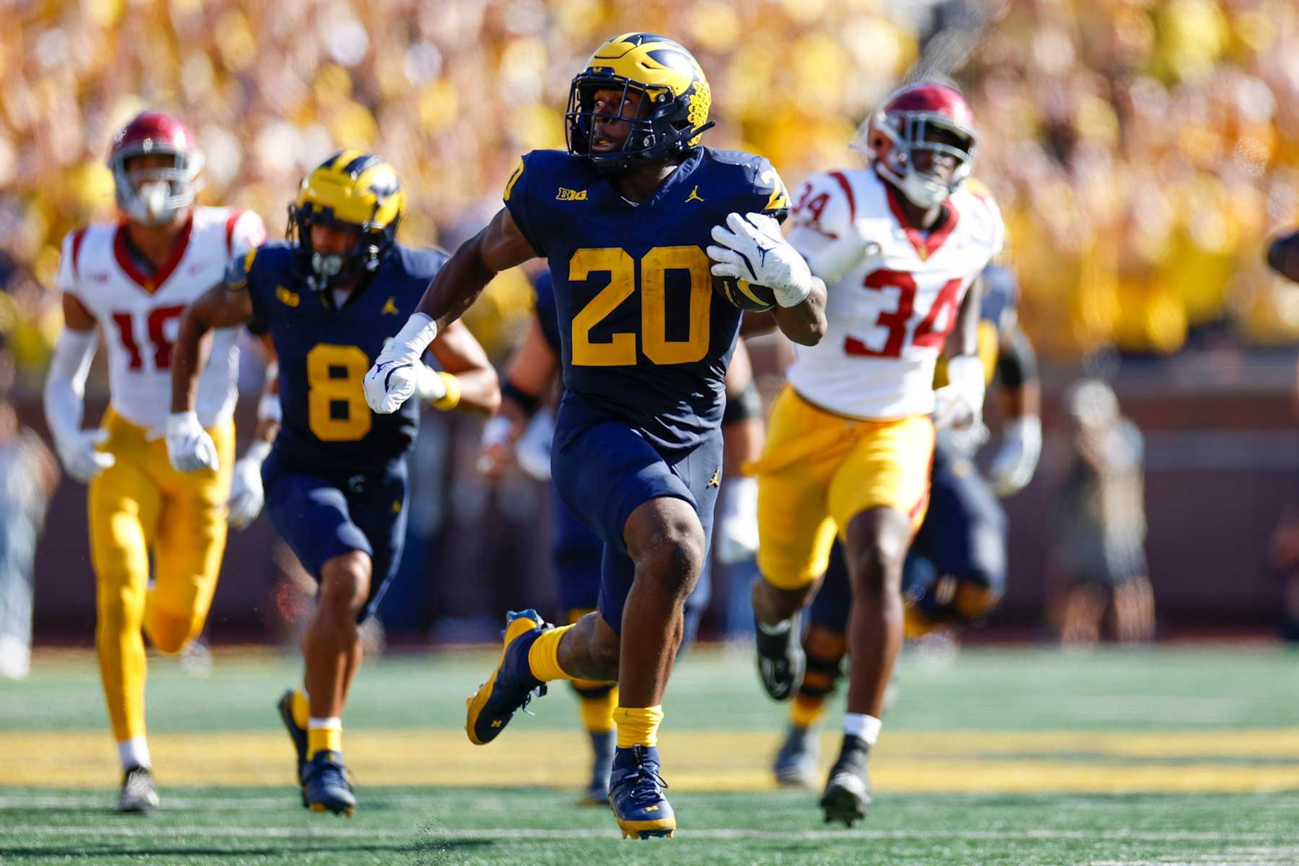 ANN ARBOR, MICHIGAN - SEPTEMBER 21: Kalel Mullings #20 of the Michigan Wolverines runs with the ball for a touchdown in the first quarter during a game against the USC Trojans at Michigan Stadium on September 21, 2024 in Ann Arbor, Michigan. (Photo by Brandon Sloter/Getty Images)