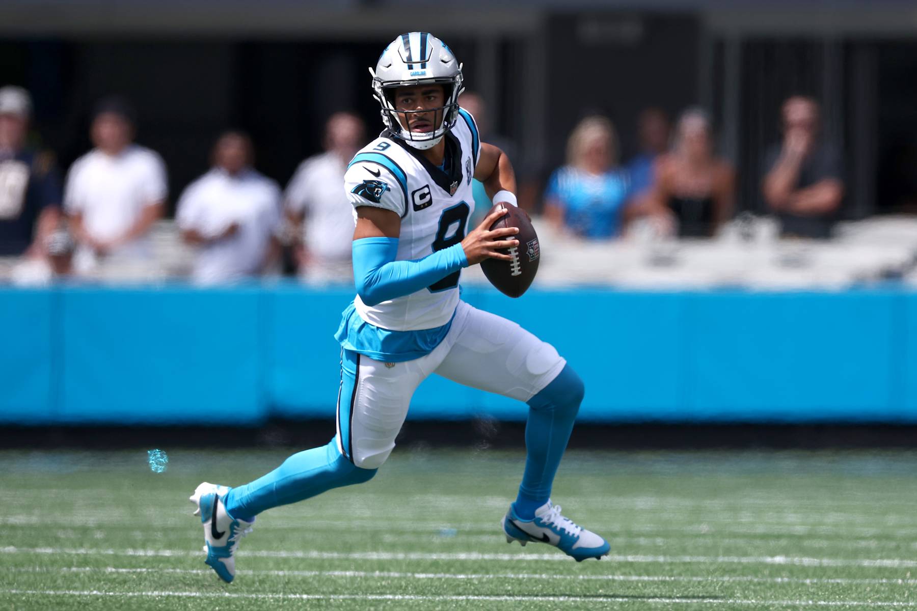 CHARLOTTE, NORTH CAROLINA - SEPTEMBER 15: Quarterback Bryce Young #9 of the Carolina Panthers scrambles from the pocket during the first half of the game at Bank of America Stadium on September 15, 2024 in Charlotte, North Carolina. (Photo by Jared C. Tilton/Getty Images) CHARLOTTE, NORTH CAROLINA - SEPTEMBER 15: Quarterback Bryce Young #9 of the Carolina Panthers scrambles from the pocket during the first half of the game at Bank of America Stadium on September 15, 2024 in Charlotte, North Carolina. (Photo by Jared C. Tilton/Getty Images)
