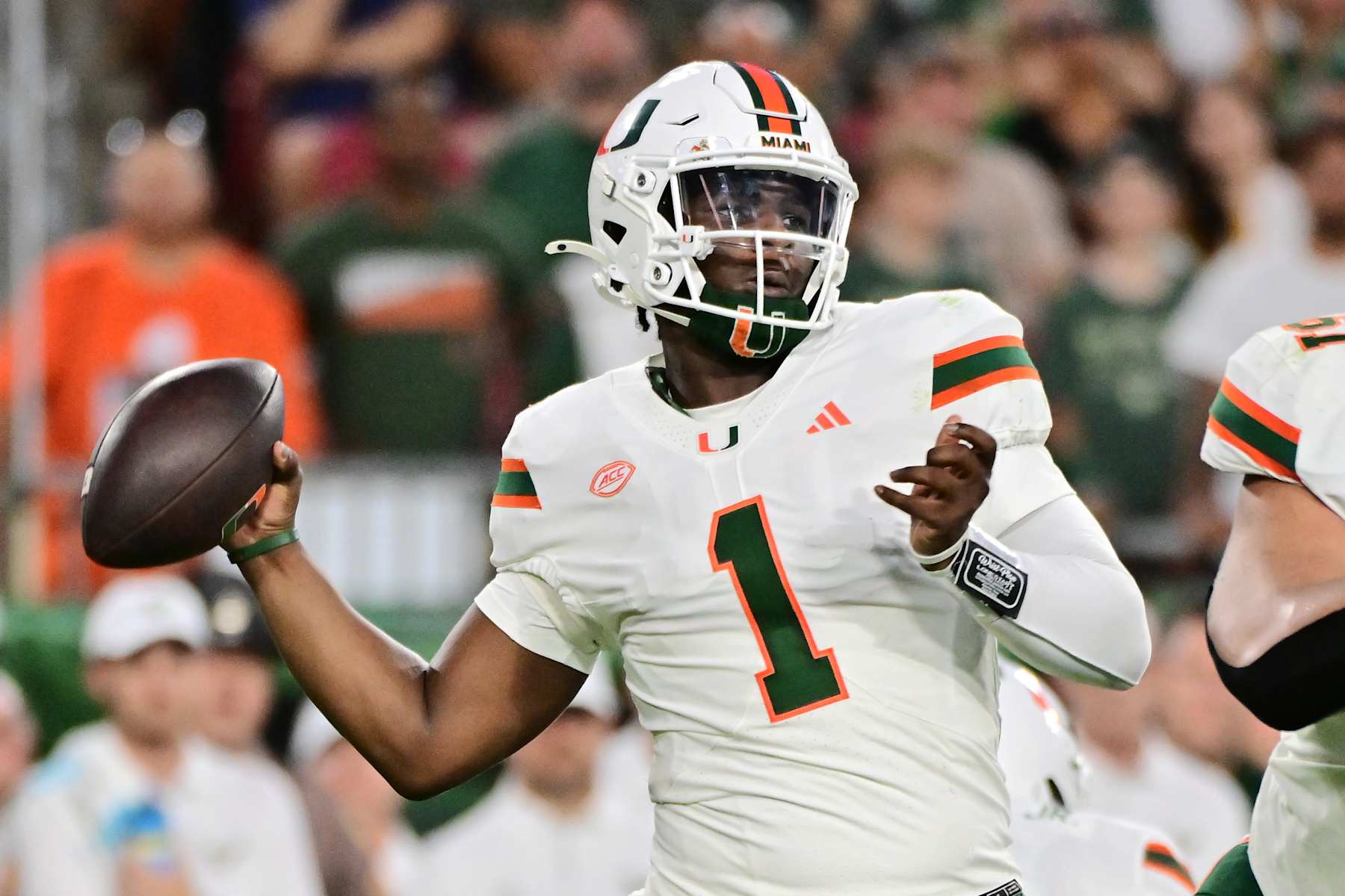 TAMPA, FLORIDA - SEPTEMBER 21: Cam Ward #1 of the Miami Hurricanes drops back to throw a pass in the first quarter against the South Florida Bulls at Raymond James Stadium on September 21, 2024 in Tampa, Florida. (Photo by Julio Aguilar/Getty Images)