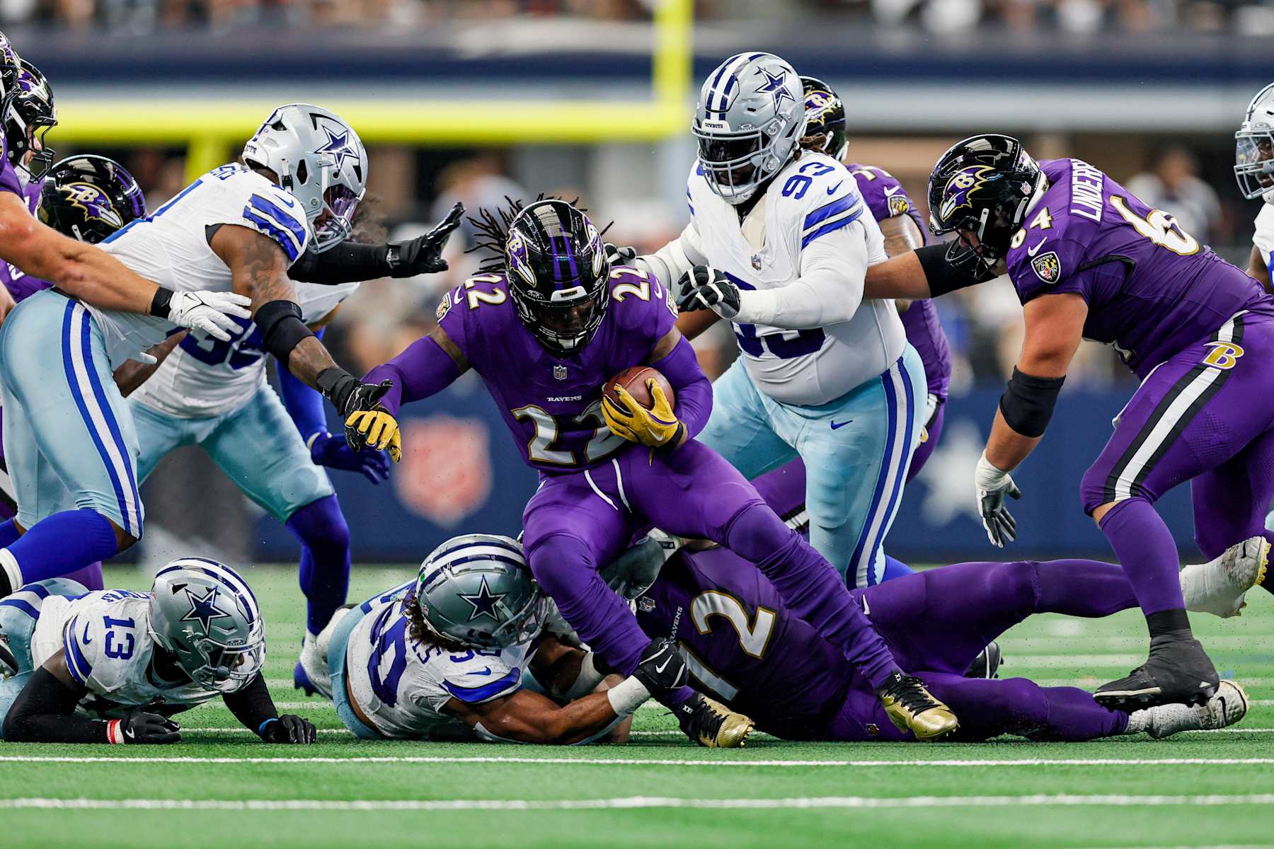 ARLINGTON, TX - SEPTEMBER 22: Baltimore Ravens running back Derrick Henry (22) gets stopped by Dallas Cowboys linebacker Eric Kendricks (50) during the game between the Dallas Cowboys and the Baltimore Ravens on September 22, 2024 at AT&T Stadium in Arlington, Texas. (Photo by Matthew Pearce/Icon Sportswire via Getty Images)