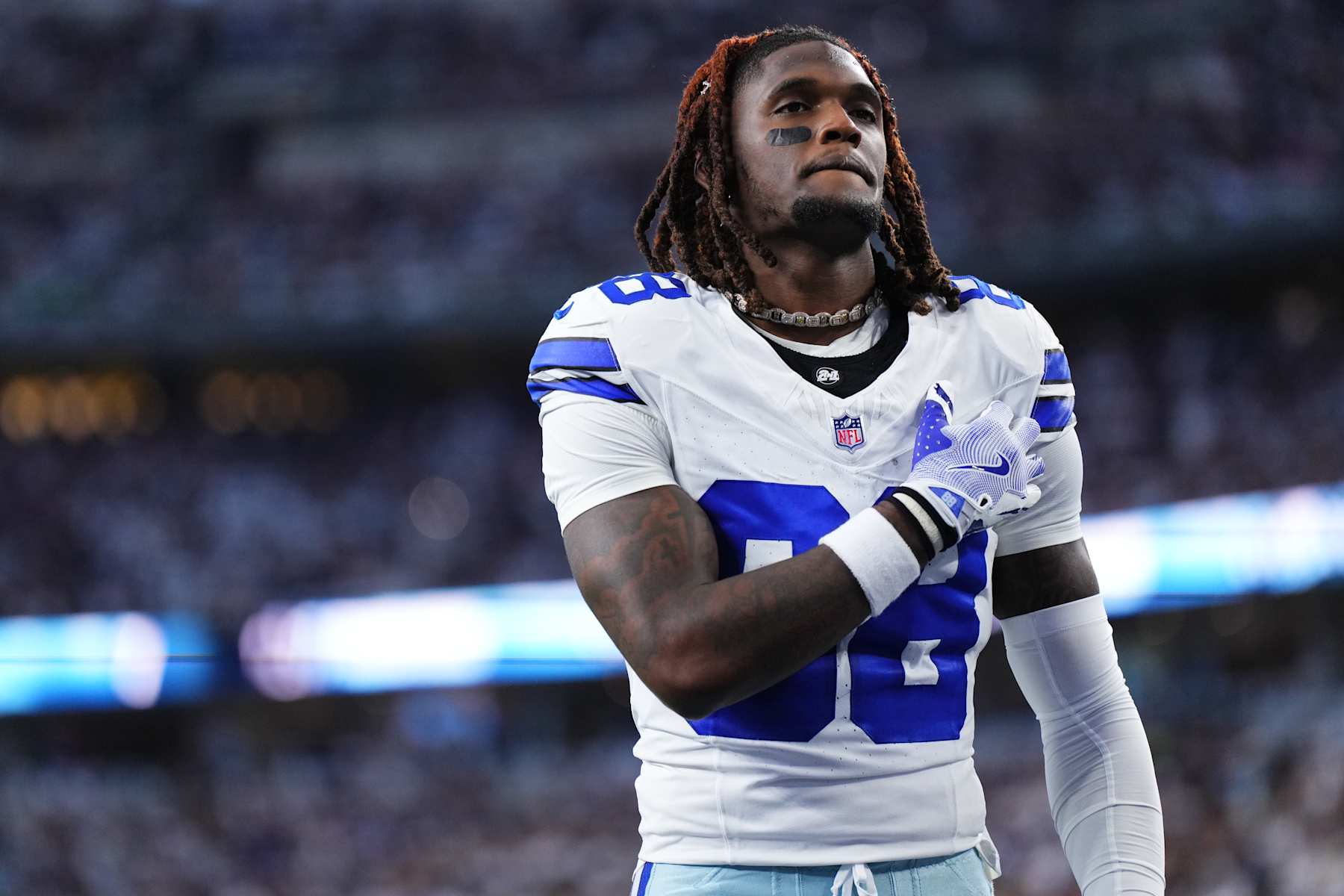 ARLINGTON, TX - SEPTEMBER 22: CeeDee Lamb #88 of the Dallas Cowboys looks on before kickoff against the Baltimore Ravens during an NFL football game at AT&T Stadium on September 22, 2024 in Arlington, Texas. (Photo by Cooper Neill/Getty Images)