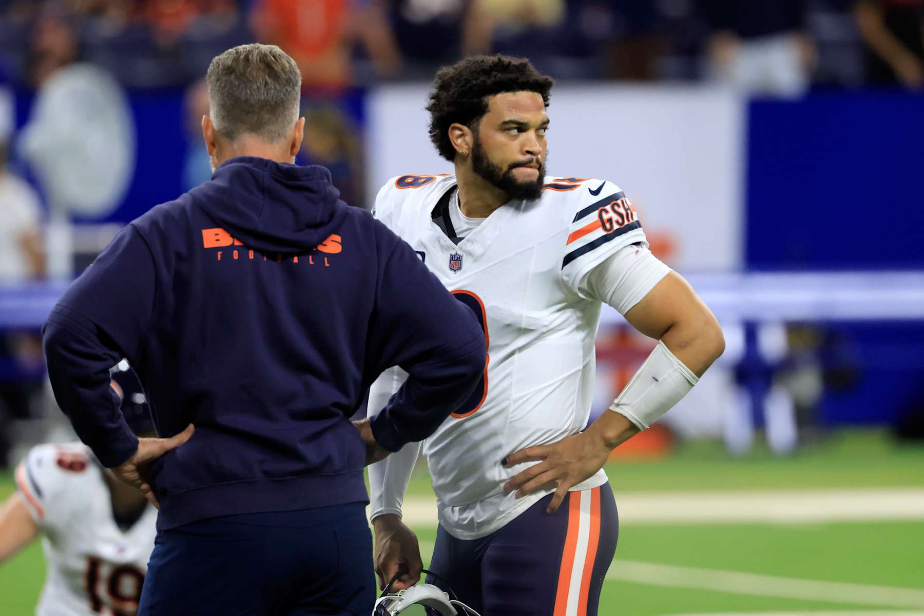 INDIANAPOLIS, INDIANA - SEPTEMBER 22: Head coach Matt Eberflus and quarterback Caleb Williams #18 of the Chicago Bears speak on the field prior to a game against the Indianapolis Colts at Lucas Oil Stadium on September 22, 2024 in Indianapolis, Indiana. (Photo by Justin Casterline/Getty Images)