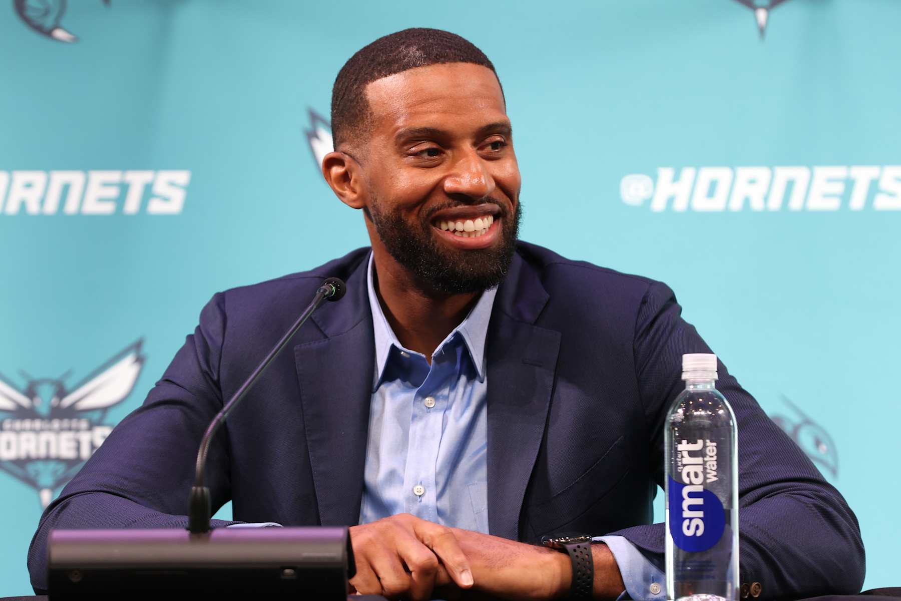 CHARLOTTE, NC - JUNE 28: Head Coach Charles Lee of the Charlotte Hornets smiles during the draft press conference on June 28, 2024 at Spectrum Center in Charlotte, North Carolina. NOTE TO USER: User expressly acknowledges and agrees that, by downloading and or using this photograph, User is consenting to the terms and conditions of the Getty Images License Agreement.  Mandatory Copyright Notice:  Copyright 2024 NBAE (Photo by Kent Smith/NBAE via Getty Images)