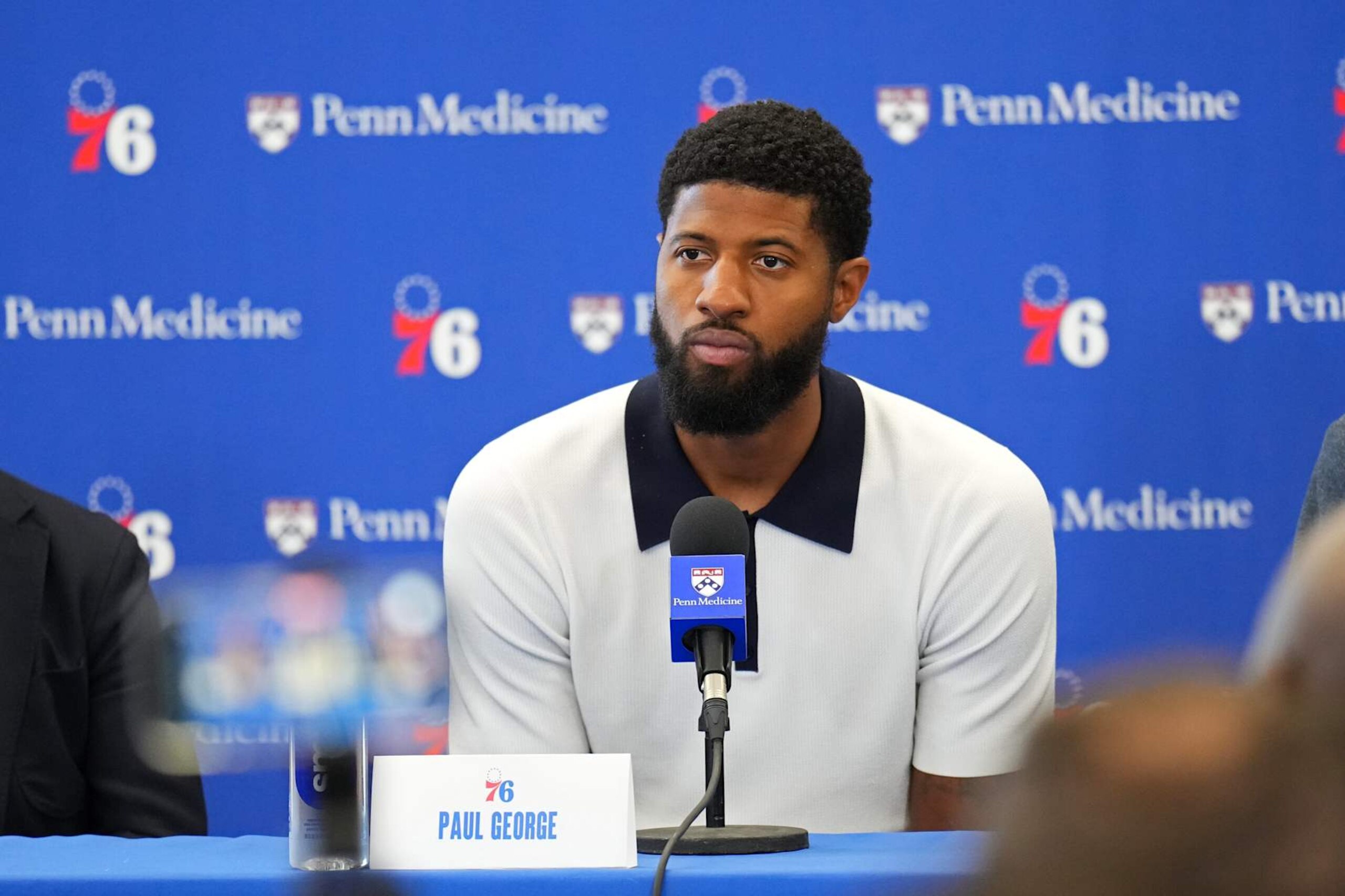 PHILADELPHIA, PA - JULY 23: Paul George #8 of the Philadelphia 76ers talks to the media during his Philadelphia 76ers introductory press conference on July 23, 2024 at the Wells Fargo Center in Philadelphia, Pennsylvania NOTE TO USER: User expressly acknowledges and agrees that, by downloading and/or using this Photograph, user is consenting to the terms and conditions of the Getty Images License Agreement. Mandatory Copyright Notice: Copyright 2024 NBAE (Photo by Jesse D. Garrabrant/NBAE via Getty Images) PHILADELPHIA, PA - JULY 23: Paul George #8 of the Philadelphia 76ers talks to the media during his Philadelphia 76ers introductory press conference on July 23, 2024 at the Wells Fargo Center in Philadelphia, Pennsylvania NOTE TO USER: User expressly acknowledges and agrees that, by downloading and/or using this Photograph, user is consenting to the terms and conditions of the Getty Images License Agreement. Mandatory Copyright Notice: Copyright 2024 NBAE (Photo by Jesse D. Garrabrant/NBAE via Getty Images)