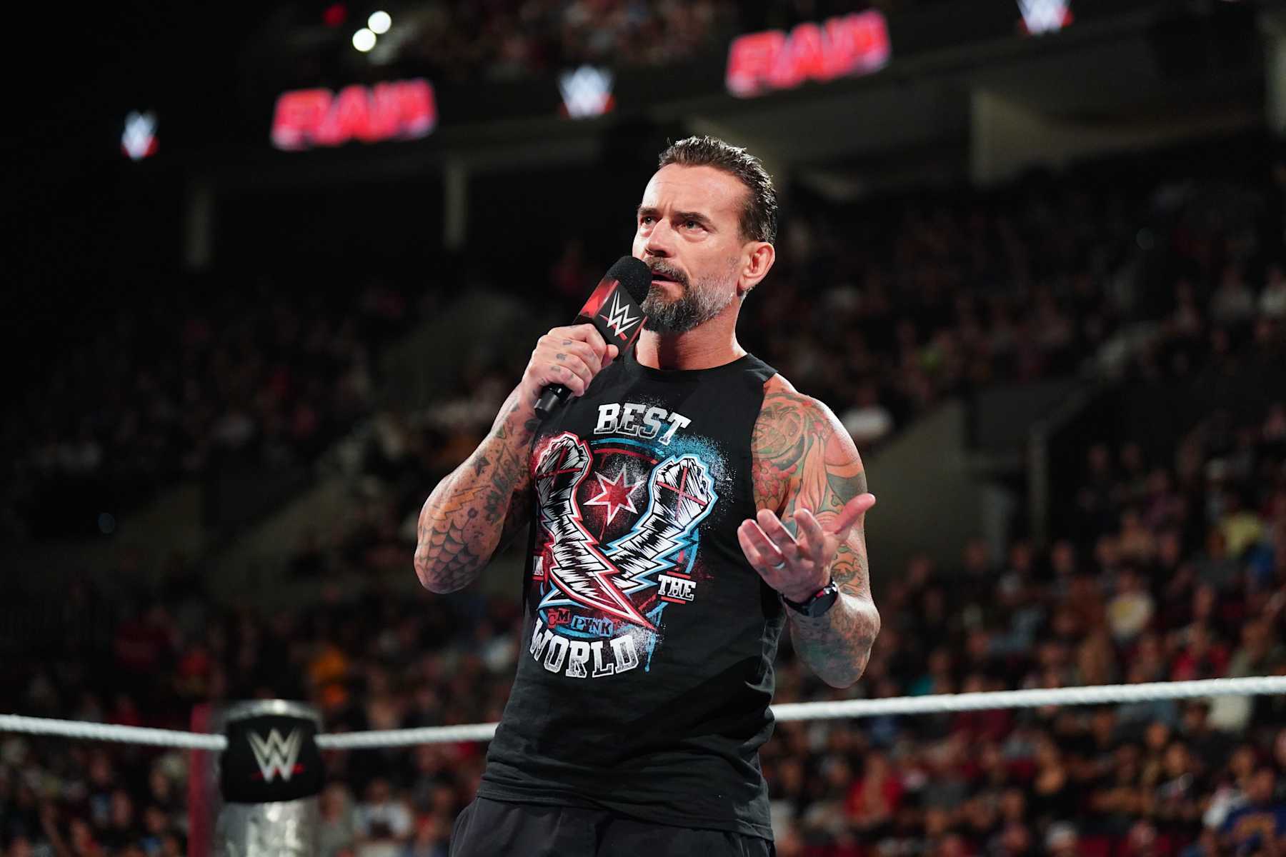 PORTLAND, OREGON - SEPTEMBER 16: CM Punk addresses the crowd during Monday Night RAW at Moda Center on September 16, 2024 in Portland, Oregon. (Photo by WWE/Getty Images)