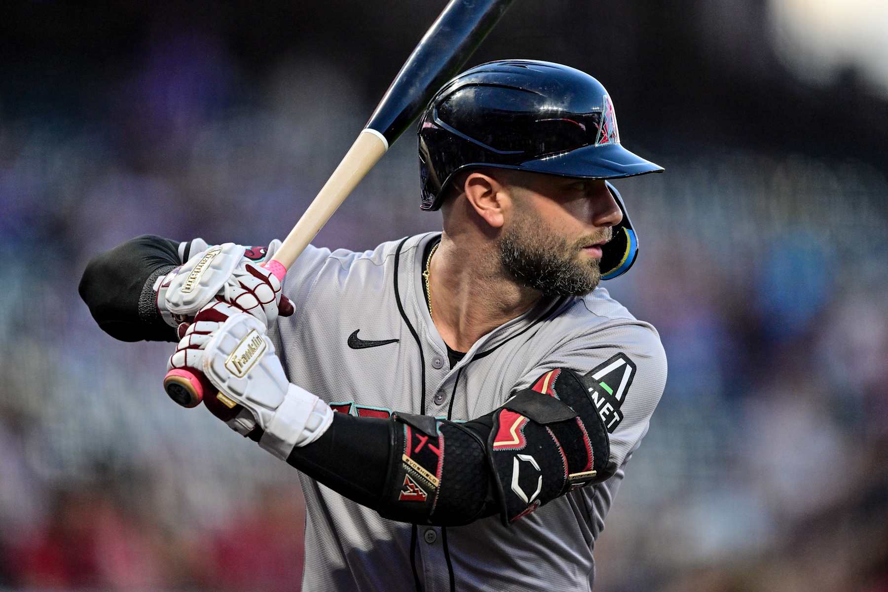DENVER, COLORADO - SEPTEMBER 16: Christian Walker #53 of the Arizona Diamondbacks warms up before batting in the first inning against the Colorado Rockies at Coors Field on September 16, 2024 in Denver, Colorado. (Photo by Dustin Bradford/Getty Images)