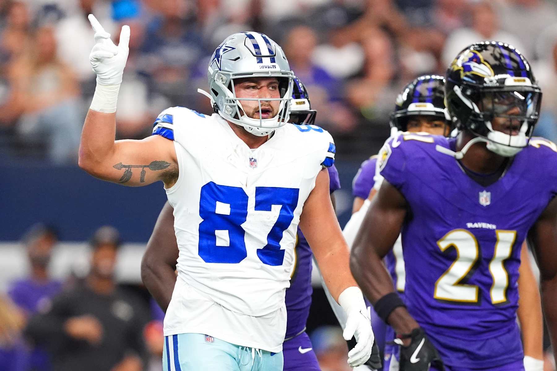 ARLINGTON, TEXAS - SEPTEMBER 22: Jake Ferguson #87 of the Dallas Cowboys reacts after a first down against the Baltimore Ravens during the first quarter at AT&T Stadium on September 22, 2024 in Arlington, Texas. (Photo by Sam Hodde/Getty Images)