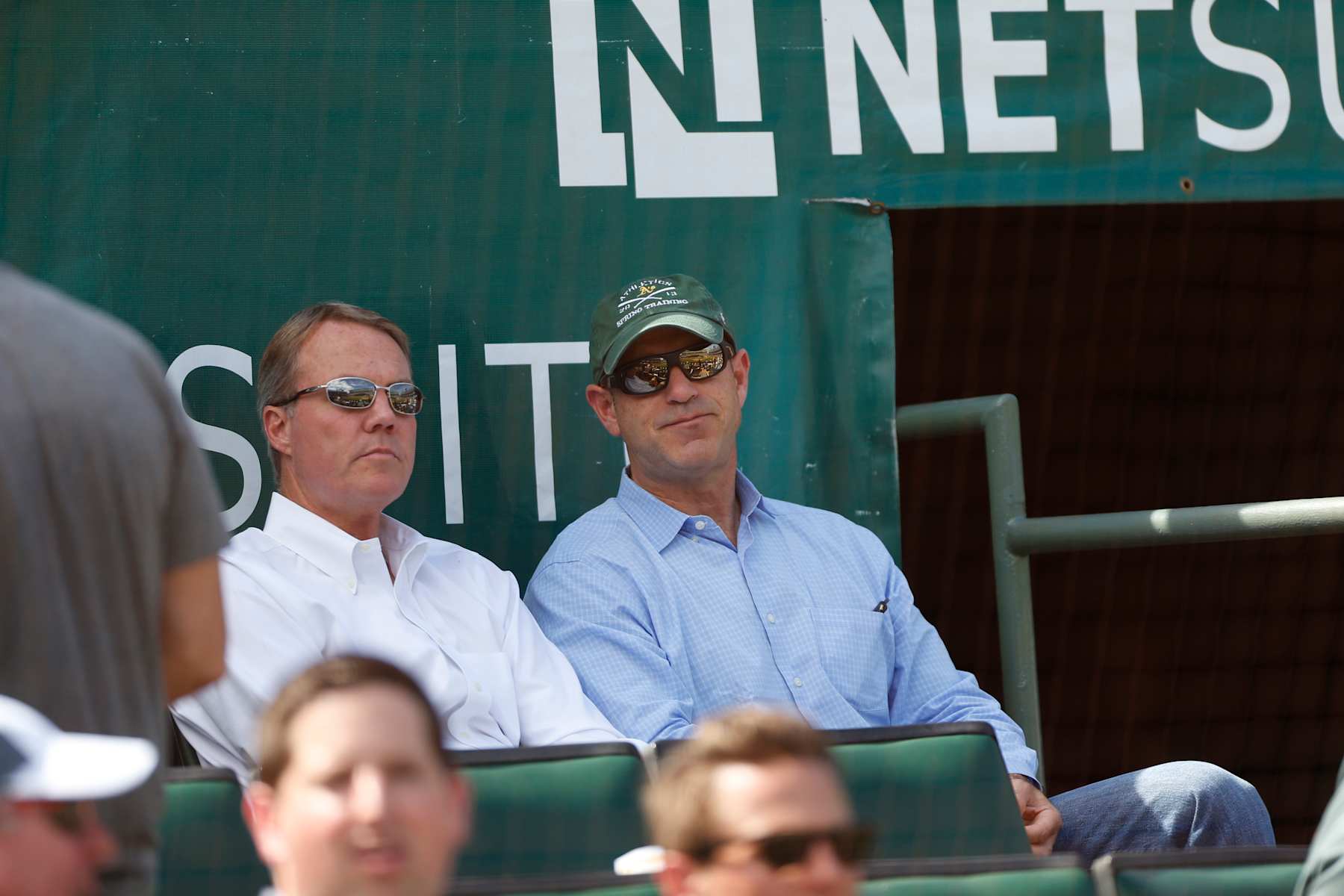 OAKLAND, CA - SEPTEMBER 24: President Michael Crowley and Owner John Fisher of the Oakland Athletics sit in the stands during the game against the Texas Rangers at O.co Coliseum on September 24, 2015 in Oakland, California. The Rangers defeated the Athletics 8-1. (Photo by Michael Zagaris/Oakland Athletics/Getty Images)  