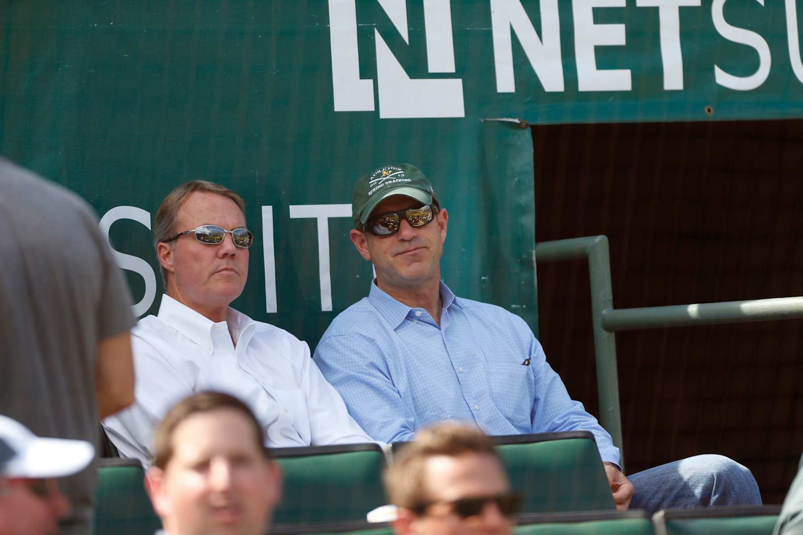 OAKLAND, CA - SEPTEMBER 24: President Michael Crowley and Owner John Fisher of the Oakland Athletics sit in the stands during the game against the Texas Rangers at O.co Coliseum on September 24, 2015 in Oakland, California. The Rangers defeated the Athletics 8-1. (Photo by Michael Zagaris/Oakland Athletics/Getty Images) OAKLAND, CA - SEPTEMBER 24: President Michael Crowley and Owner John Fisher of the Oakland Athletics sit in the stands during the game against the Texas Rangers at O.co Coliseum on September 24, 2015 in Oakland, California. The Rangers defeated the Athletics 8-1. (Photo by Michael Zagaris/Oakland Athletics/Getty Images)