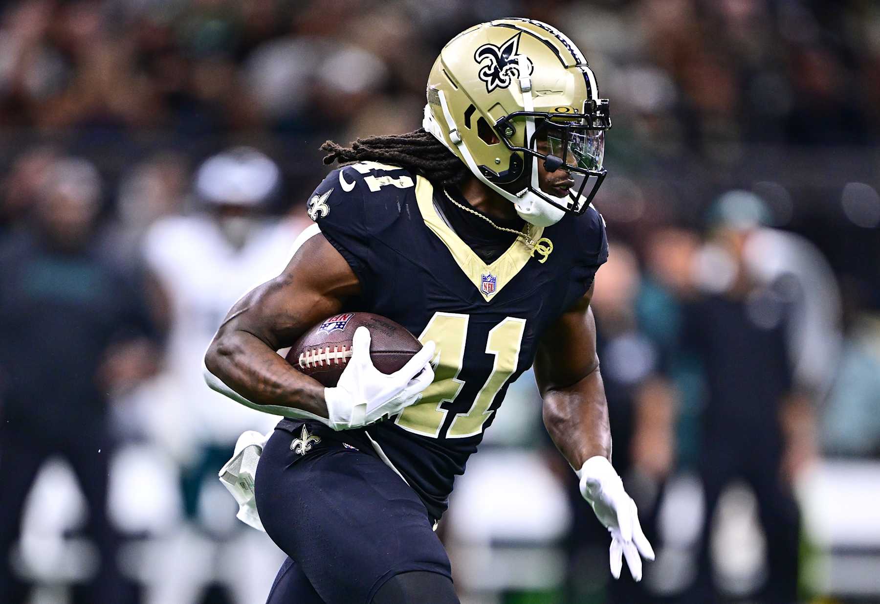 NEW ORLEANS, LOUISIANA - SEPTEMBER 22: Alvin Kamara #41 of the New Orleans Saints rushes against the Philadelphia Eagles during the first quarter at Caesars Superdome on September 22, 2024 in New Orleans, Louisiana. (Photo by Gus Stark/Getty Images)