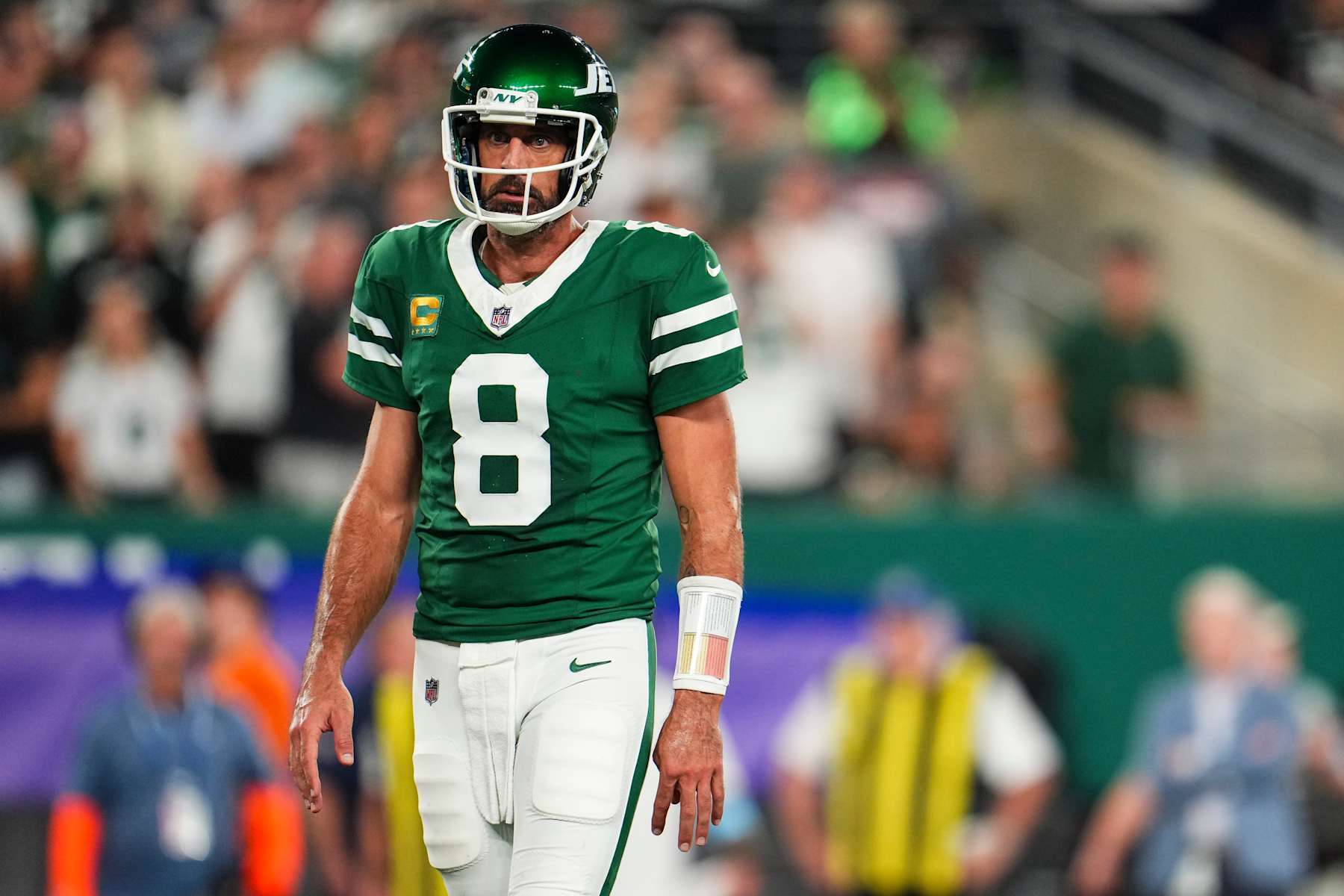 EAST RUTHERFORD, NJ - SEPTEMBER 19: Aaron Rodgers #8 of the New York Jets looks on during an NFL football game against the New England Patriots at MetLife Stadium on September 19, 2024 in East Rutherford, New Jersey. (Photo by Cooper Neill/Getty Images)