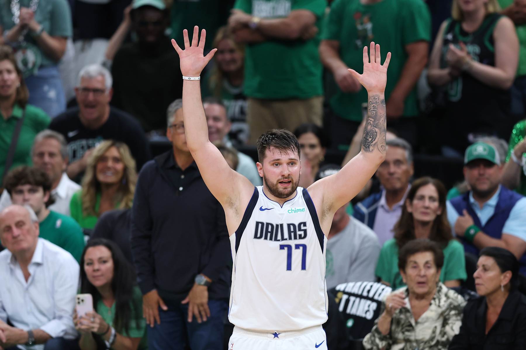 BOSTON, MASSACHUSETTS - JUNE 17: Luka Doncic #77 of the Dallas Mavericks reacts after a play against the Boston Celtics during the first quarter of Game Five of the 2024 NBA Finals at TD Garden on June 17, 2024 in Boston, Massachusetts. NOTE TO USER: User expressly acknowledges and agrees that, by downloading and or using this photograph, User is consenting to the terms and conditions of the Getty Images License Agreement. (Photo by Adam Glanzman/Getty Images)