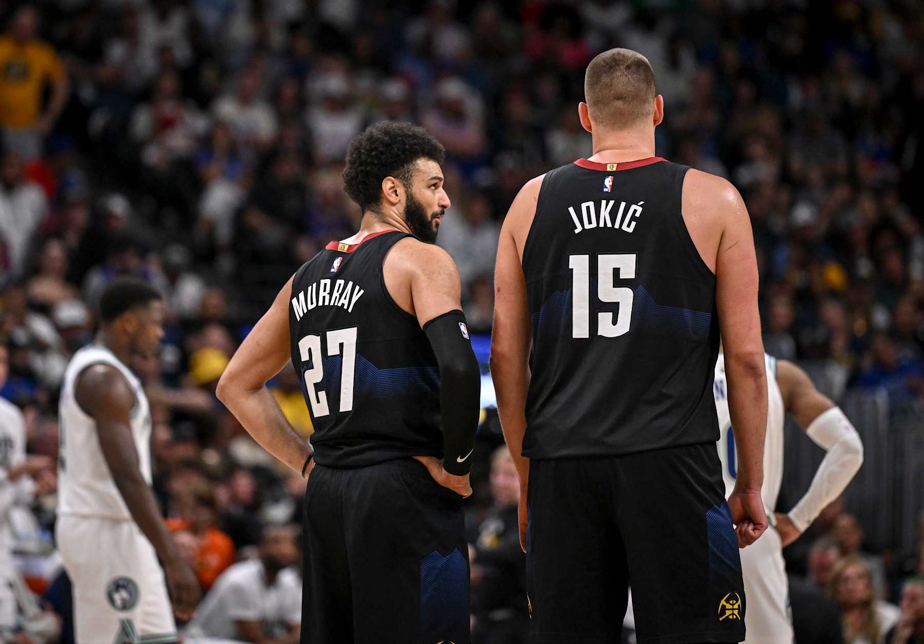 DENVER, CO - MAY 19: Jamal Murray (27) speaks to Nikola Jokic (15) of the Denver Nuggets during the second quarter against the Minnesota Timberwolves at Ball Arena in Denver on Sunday, May 19, 2024. (Photo by AAron Ontiveroz/The Denver Post)
