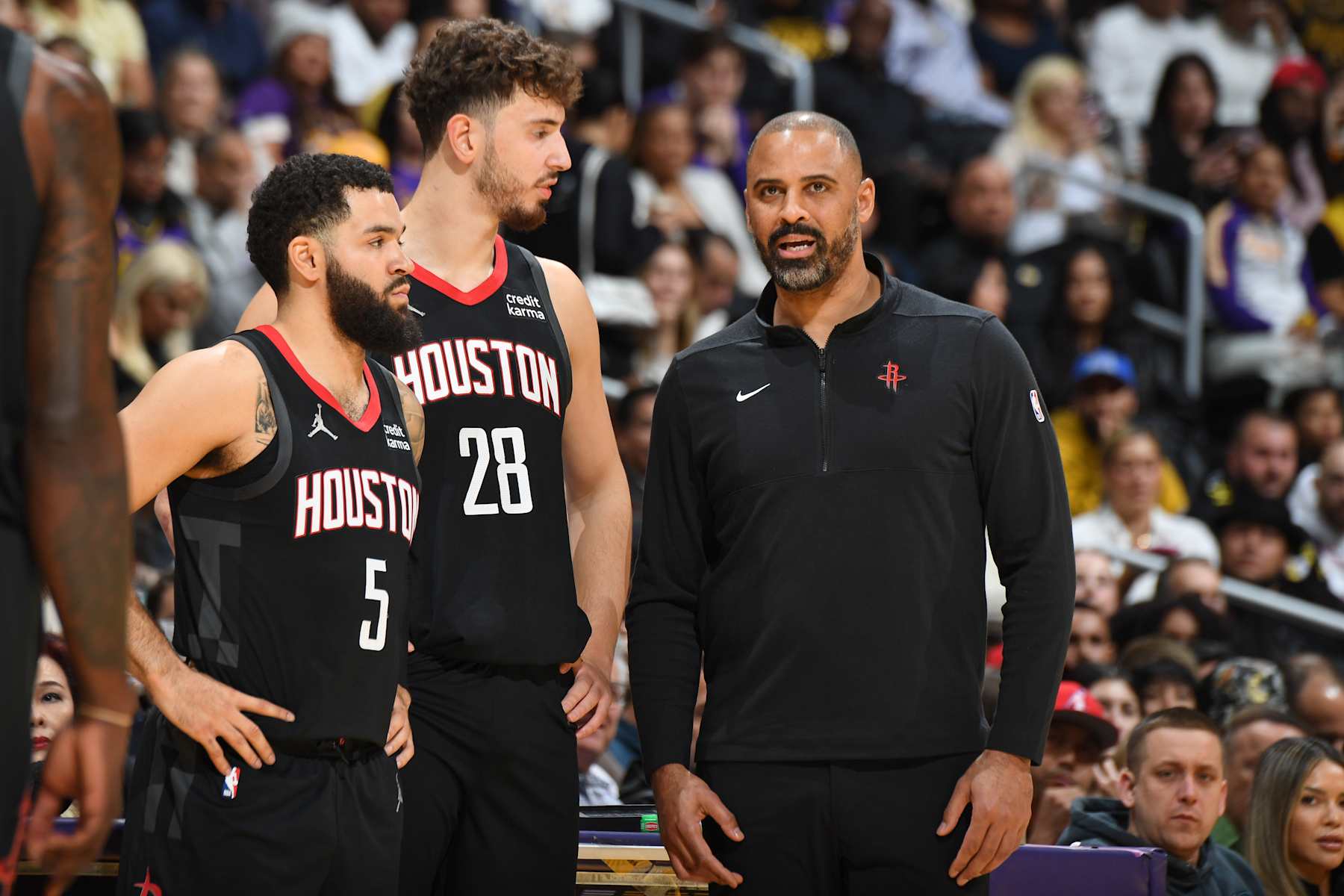 LOS ANGELES, CA - NOVEMBER 19:  Alperen Sengun #28 of the Houston Rockets, Fred VanVleet #5 of the Houston Rockets & Head Coach Ime Udoka of the Houston Rockets looks on during the game on November 19, 2023 at Crypto.Com Arena in Los Angeles, California. NOTE TO USER: User expressly acknowledges and agrees that, by downloading and/or using this Photograph, user is consenting to the terms and conditions of the Getty Images License Agreement. Mandatory Copyright Notice: Copyright 2023 NBAE (Photo by Andrew D. Bernstein/NBAE via Getty Images)