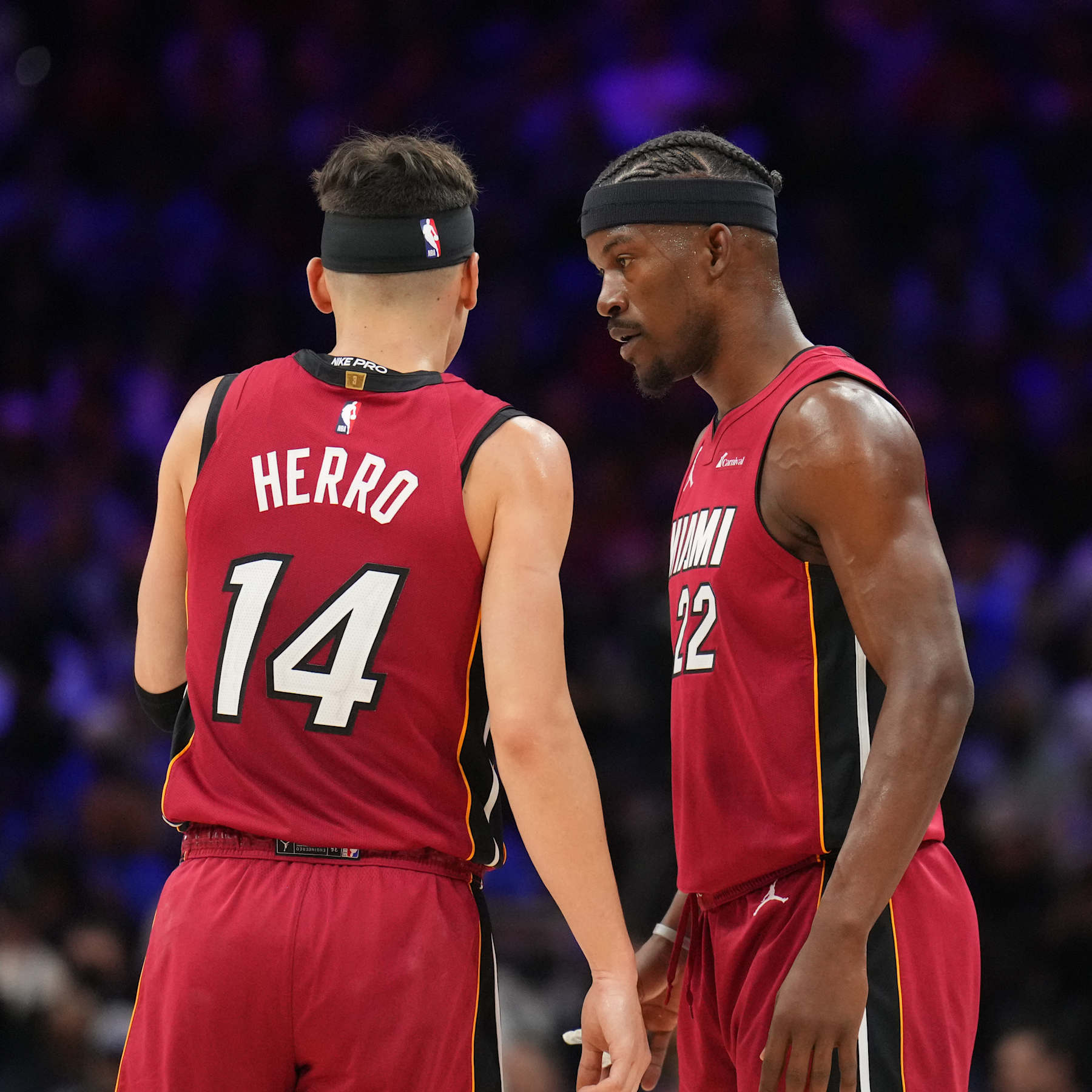 PHILADELPHIA, PA - APRIL 17: Tyler Herro #14 and Jimmy Butler #22 of the Miami Heat talk during the game against the Philadelphia 76ers during the 2024 NBA Play-In Tournament on April 17, 2024 at the Wells Fargo Center in Philadelphia, Pennsylvania NOTE TO USER: User expressly acknowledges and agrees that, by downloading and/or using this Photograph, user is consenting to the terms and conditions of the Getty Images License Agreement. Mandatory Copyright Notice: Copyright 2024 NBAE (Photo by Jesse D. Garrabrant/NBAE via Getty Images)